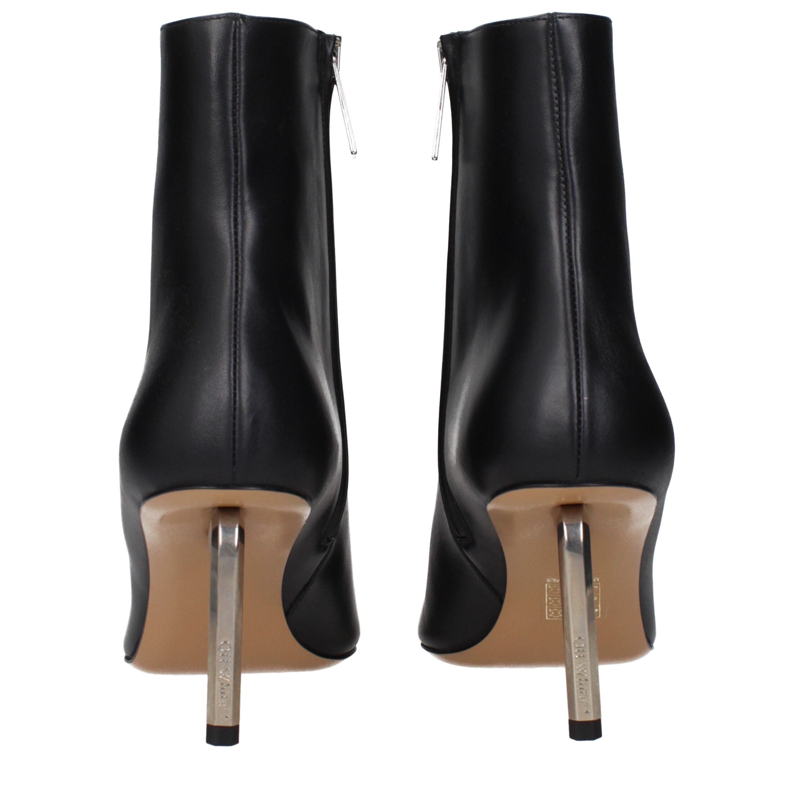 Step into a realm of sophistication with Off-White Black Leather Ankle Boots, where exquisite craftsmanship meets avant-garde elegance for the discerning fashionista.