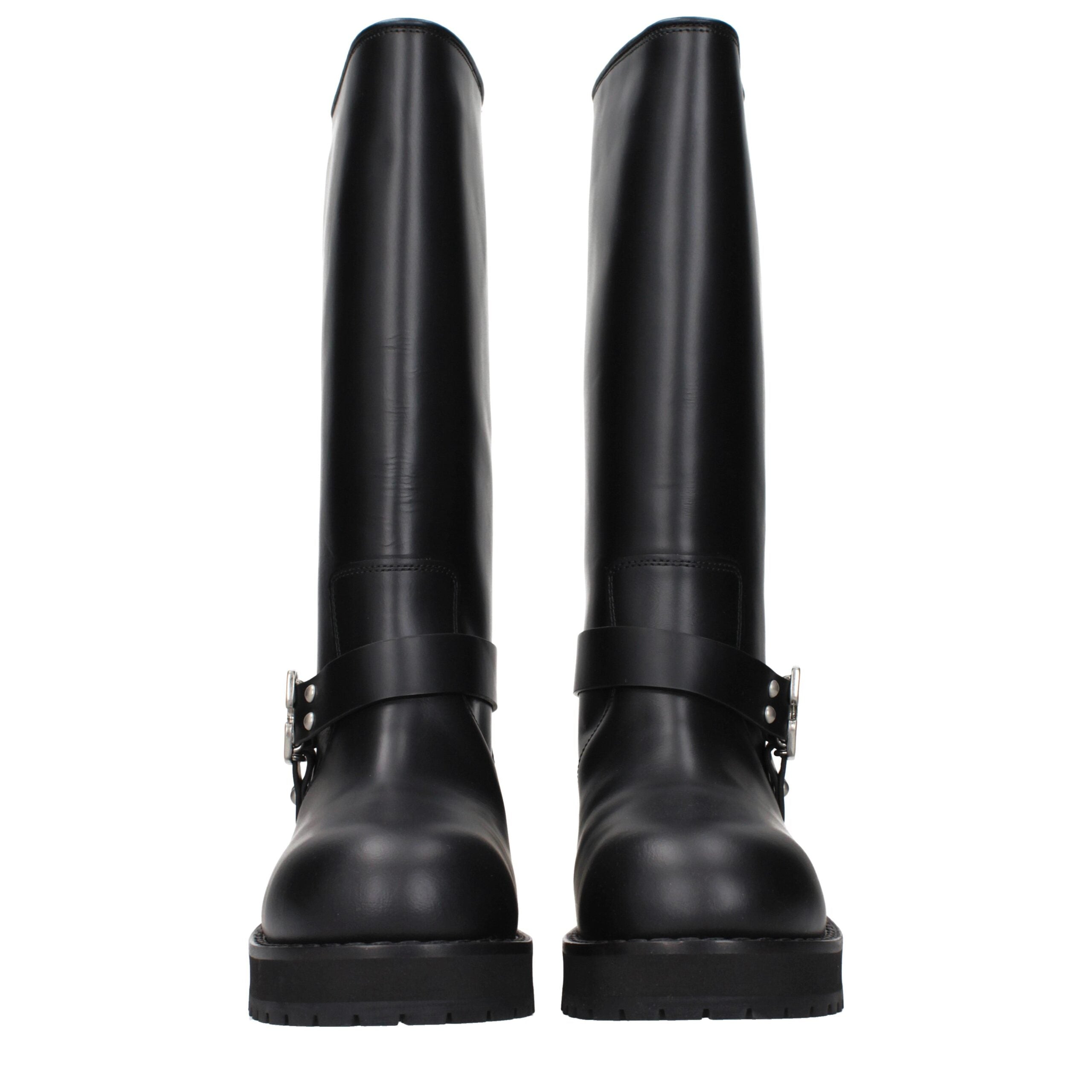 Experience the allure of Off-White Black Leather Flat Boots, where exquisite craftsmanship meets modern elegance, perfect for those who embody sophistication and grace.