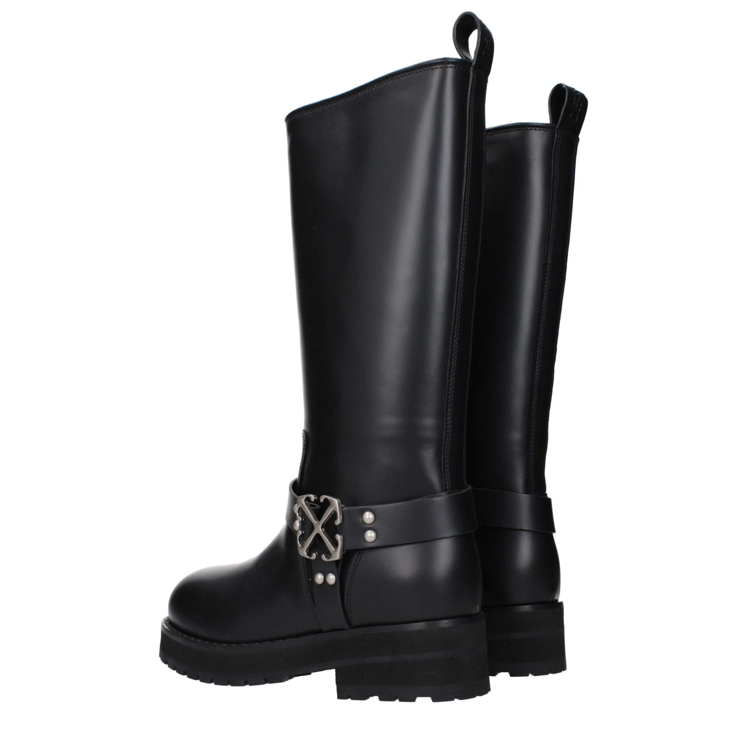 Step into the realm of luxury with Off-White Black Leather Flat Boots, where exquisite craftsmanship meets modern elegance, perfect for the discerning individual.