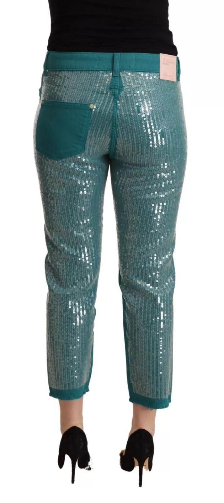 Indulge in Blumarine's Cadet Blue Sequined Cropped Trousers, where Italian craftsmanship meets luxurious allure, perfect for elevating your sophisticated wardrobe.