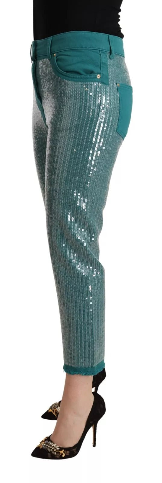 Discover Blumarine's Cadet Blue Sequined Low Waist Cropped Trouser Pants, a luxurious blend of Italian craftsmanship and contemporary elegance, perfect for any sophisticated wardrobe.