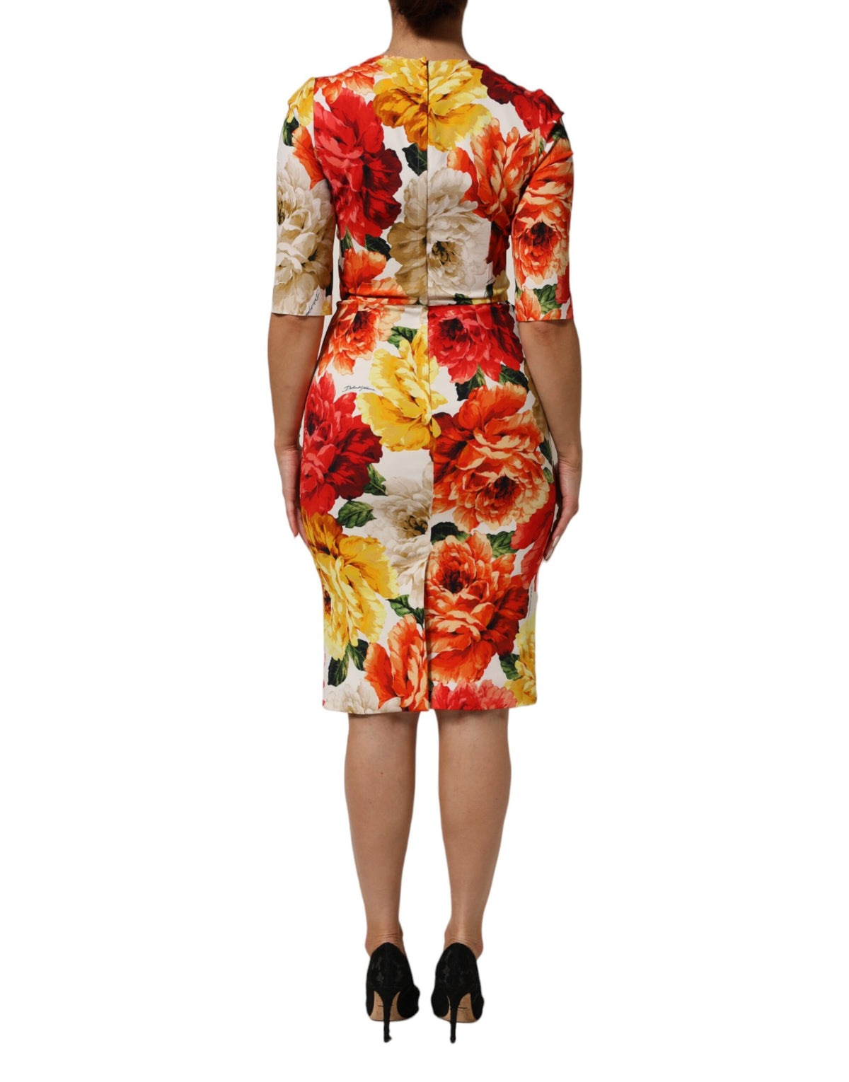 Elevate your elegance with the Dolce & Gabbana Multicolor Floral Print Viscose Sheath Dress, a luxurious fusion of exquisite craftsmanship and vibrant artistry, perfect for any sophisticated occasion.
