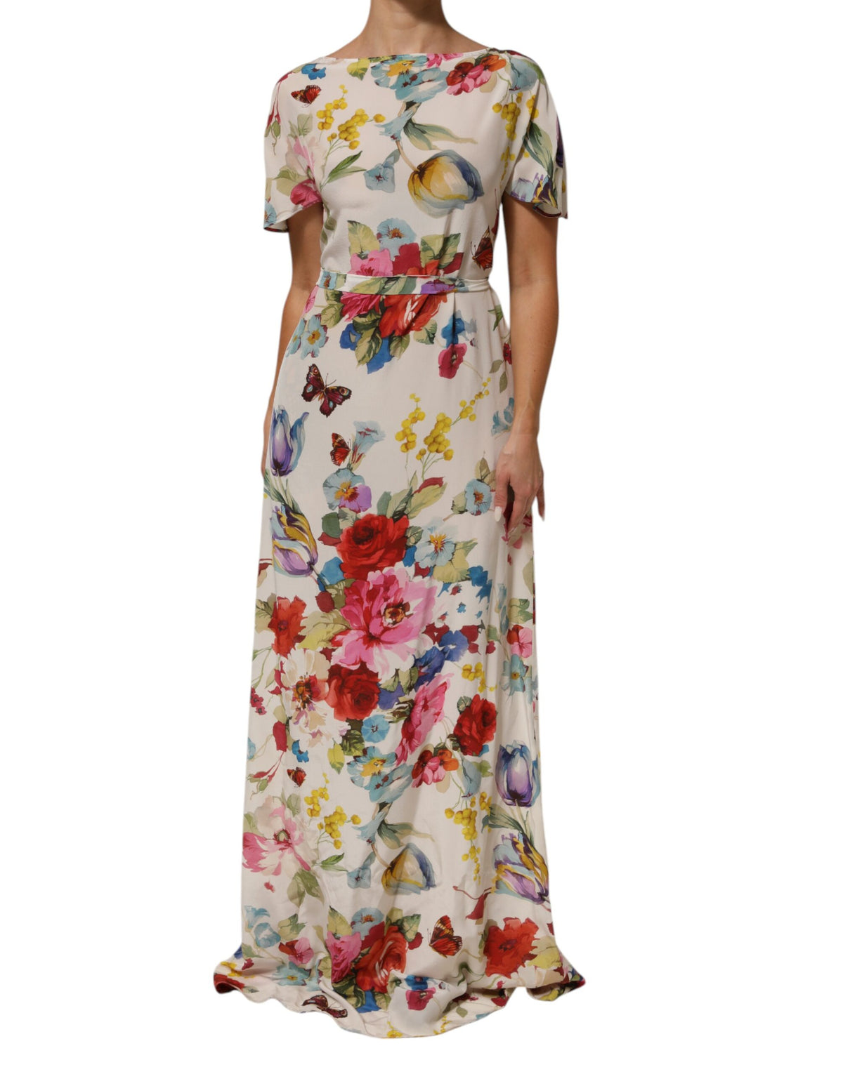 Discover the Dolce & Gabbana White Floral Print Silk Sheath Long Gown Dress, a masterpiece of Italian craftsmanship, blending luxurious silk with timeless elegance for unforgettable moments.