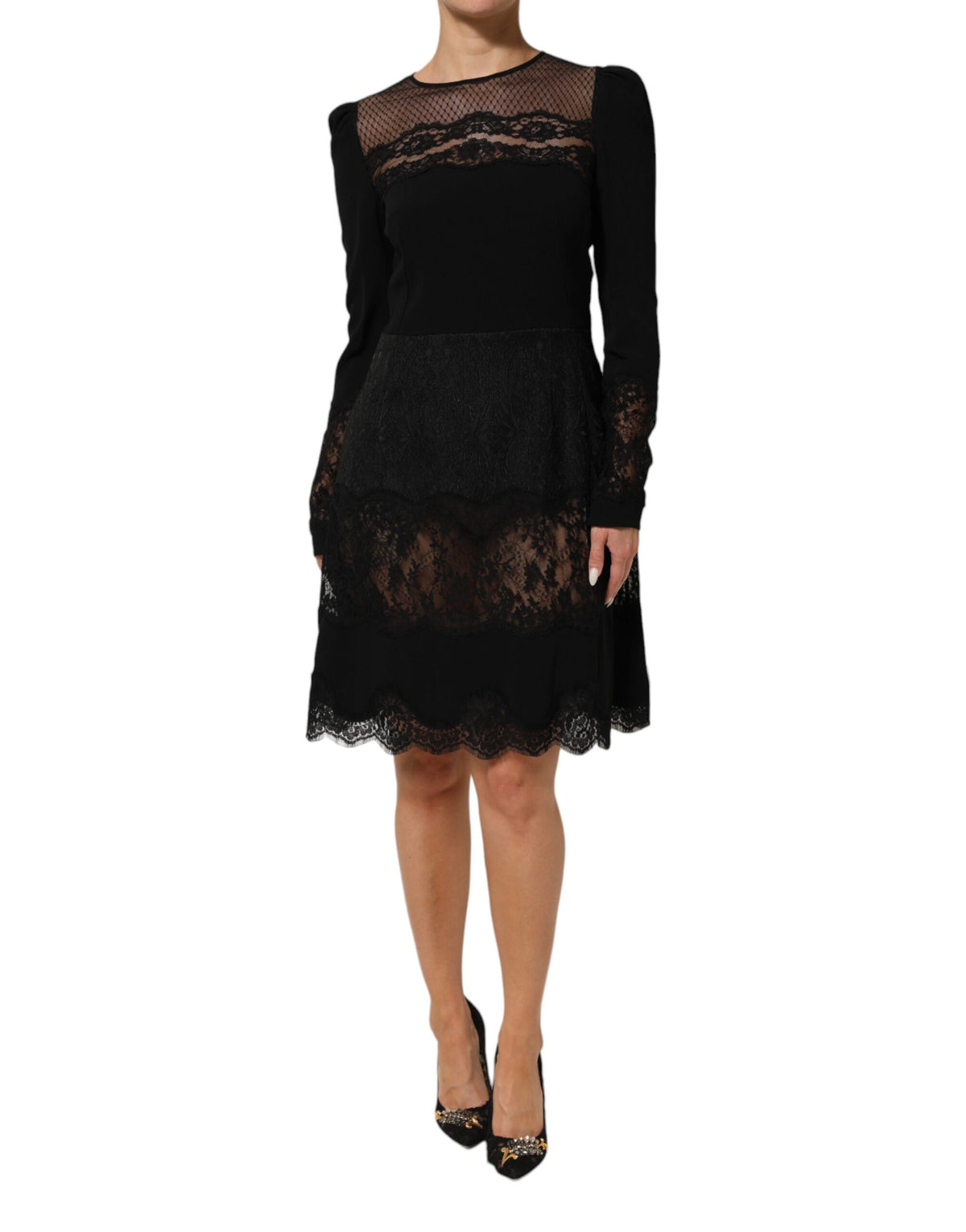 Indulge in the exquisite allure of the Dolce & Gabbana Black Floral Lace Trim Sheath A-line Dress, a masterpiece of Italian craftsmanship that embodies timeless elegance and sophistication.