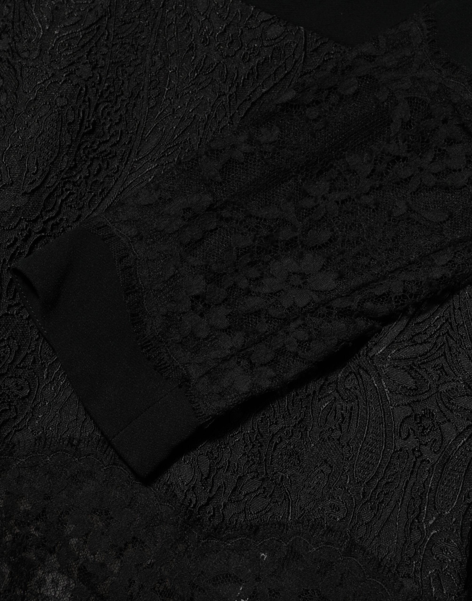 Experience the allure of the Dolce & Gabbana Black Floral Lace Trim Sheath A-line Dress, a masterpiece of Italian craftsmanship that embodies timeless elegance and sophistication.