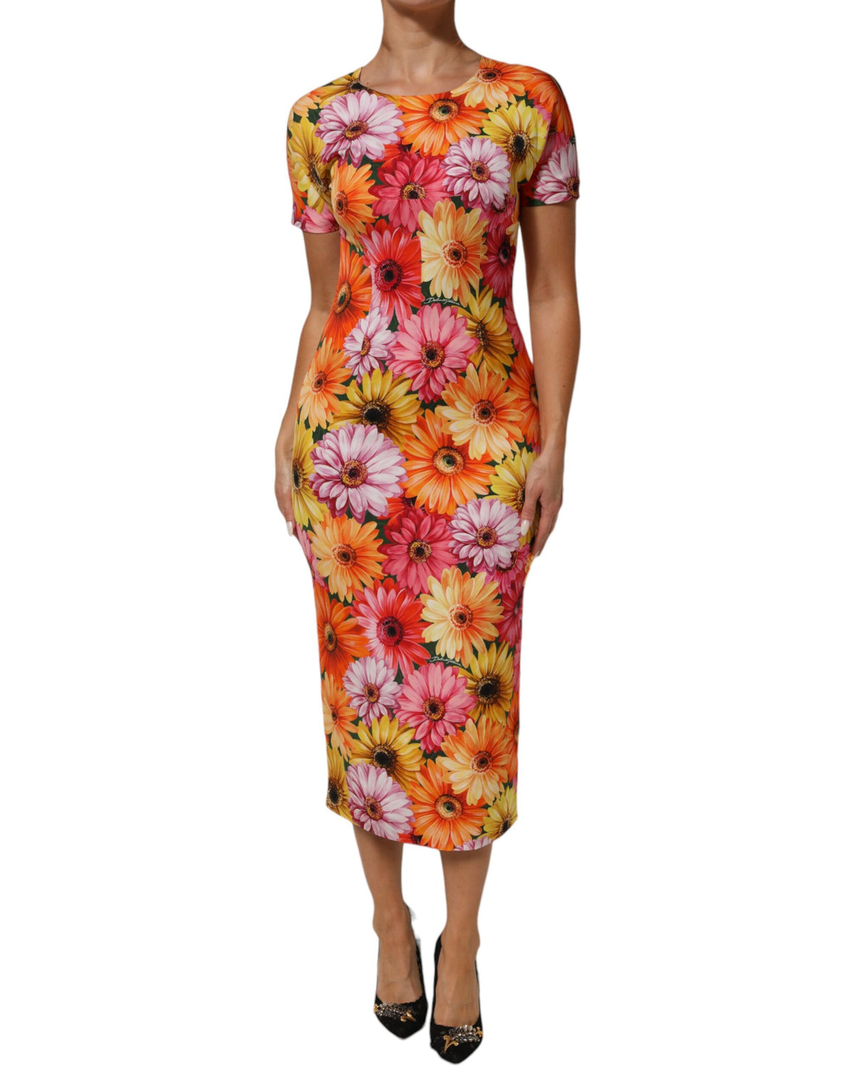 Indulge in the exquisite Dolce & Gabbana Multicolor Floral Print Silk Sheath Midi Dress, a masterpiece of Italian craftsmanship that embodies luxury and timeless elegance for every occasion.