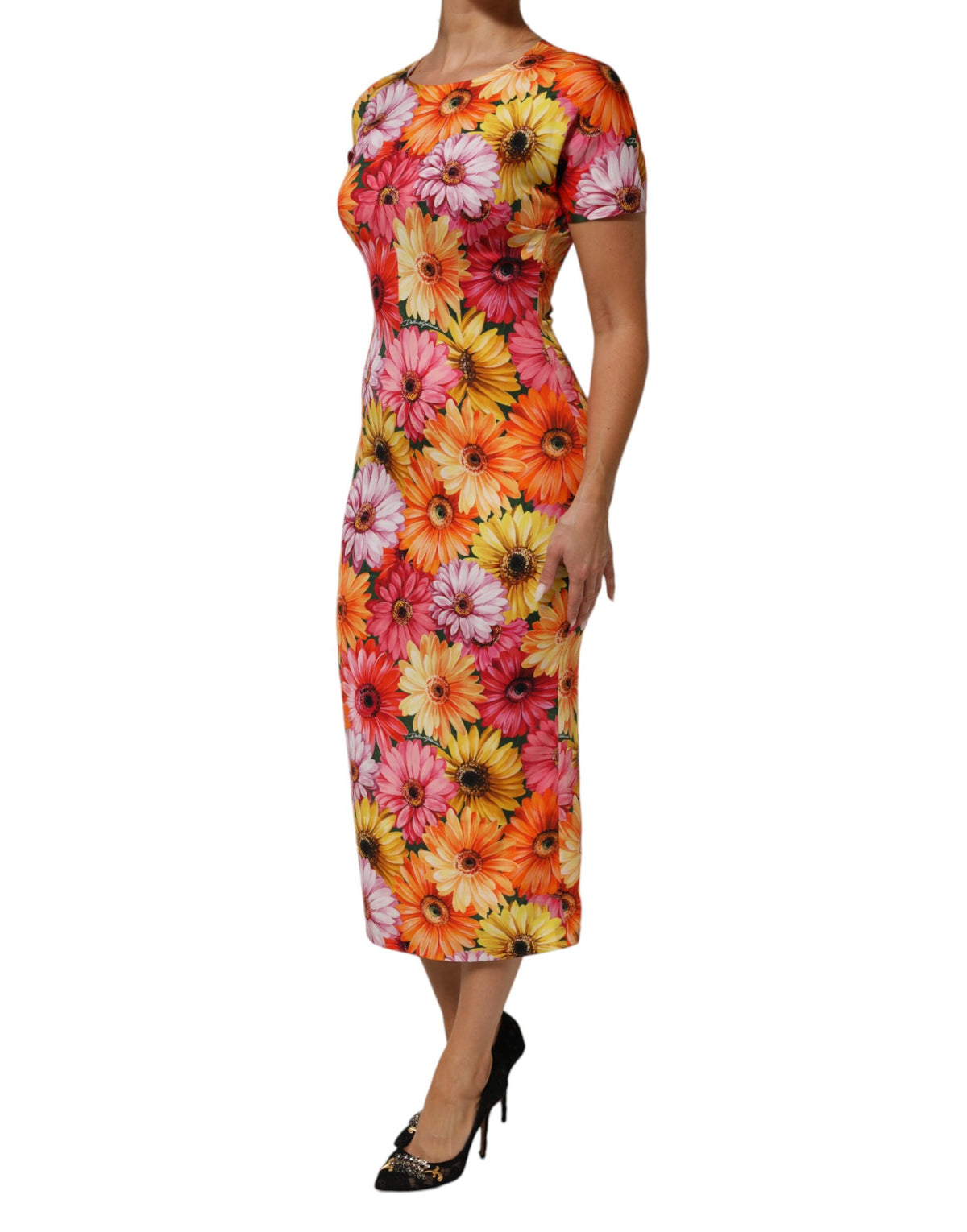 Indulge in the exquisite allure of the Dolce & Gabbana Multicolor Floral Print Silk Sheath Midi Dress, where luxurious silk meets artistic design for an unforgettable statement.