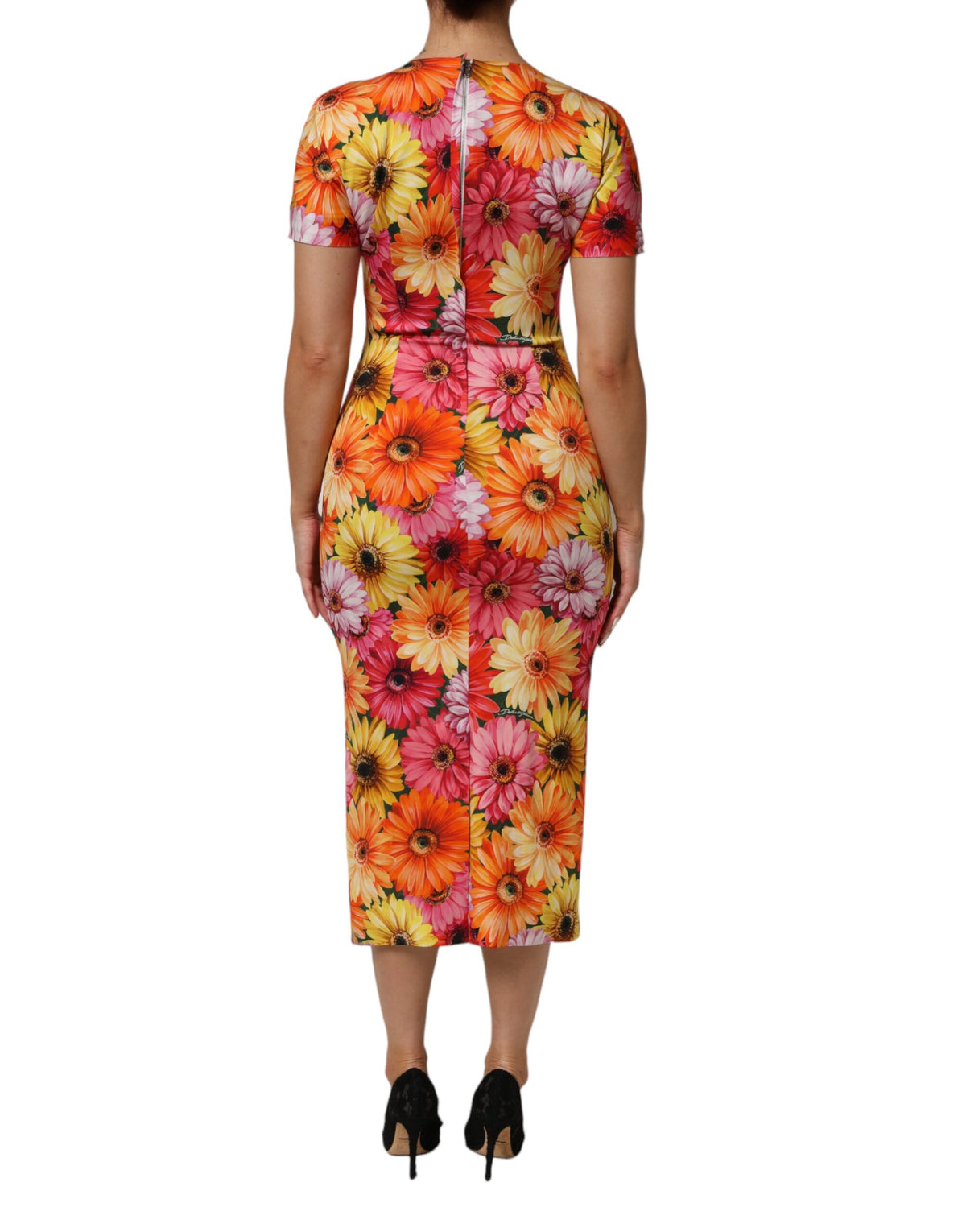 Indulge in the exquisite Dolce & Gabbana Multicolor Floral Print Silk Sheath Midi Dress, a luxurious blend of silk and elastane that embodies elegance and confidence for every occasion.
