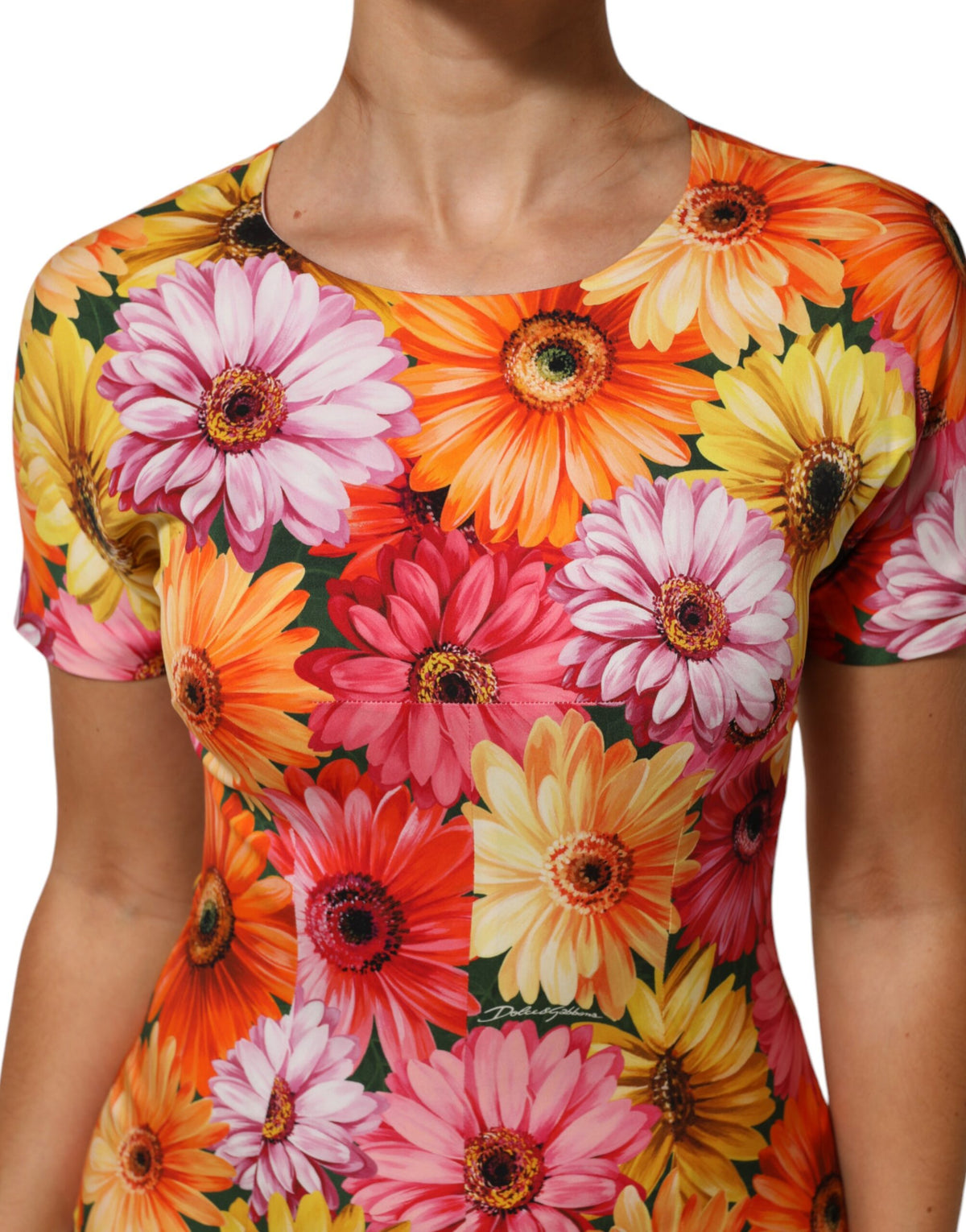 Indulge in the exquisite Dolce & Gabbana Multicolor Floral Print Silk Sheath Midi Dress, a luxurious blend of silk and elastane that embodies elegance and confidence for any occasion.