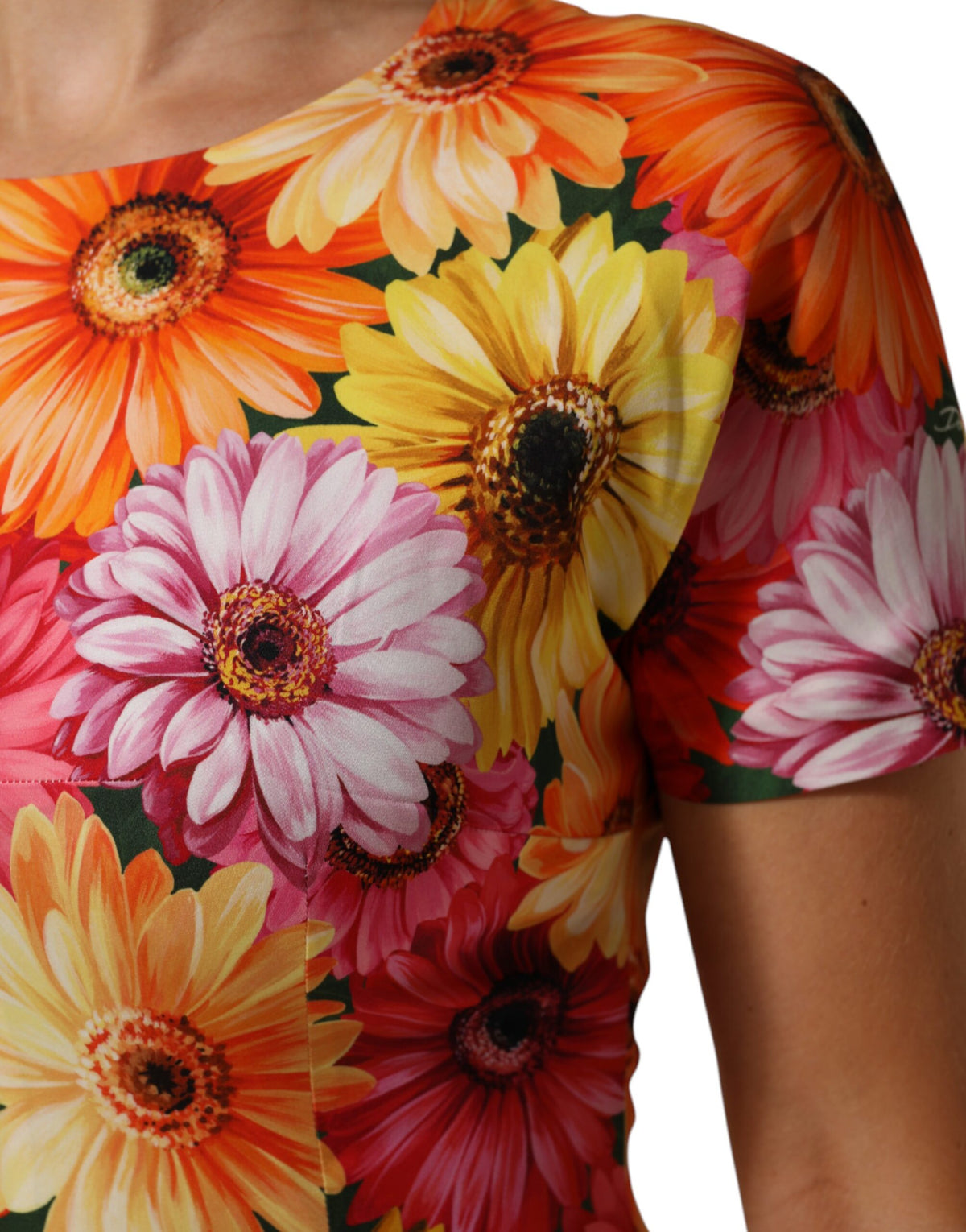 Indulge in the exquisite Dolce & Gabbana Multicolor Floral Print Silk Sheath Midi Dress, a masterpiece of Italian craftsmanship that embodies luxury and elegance for every occasion.