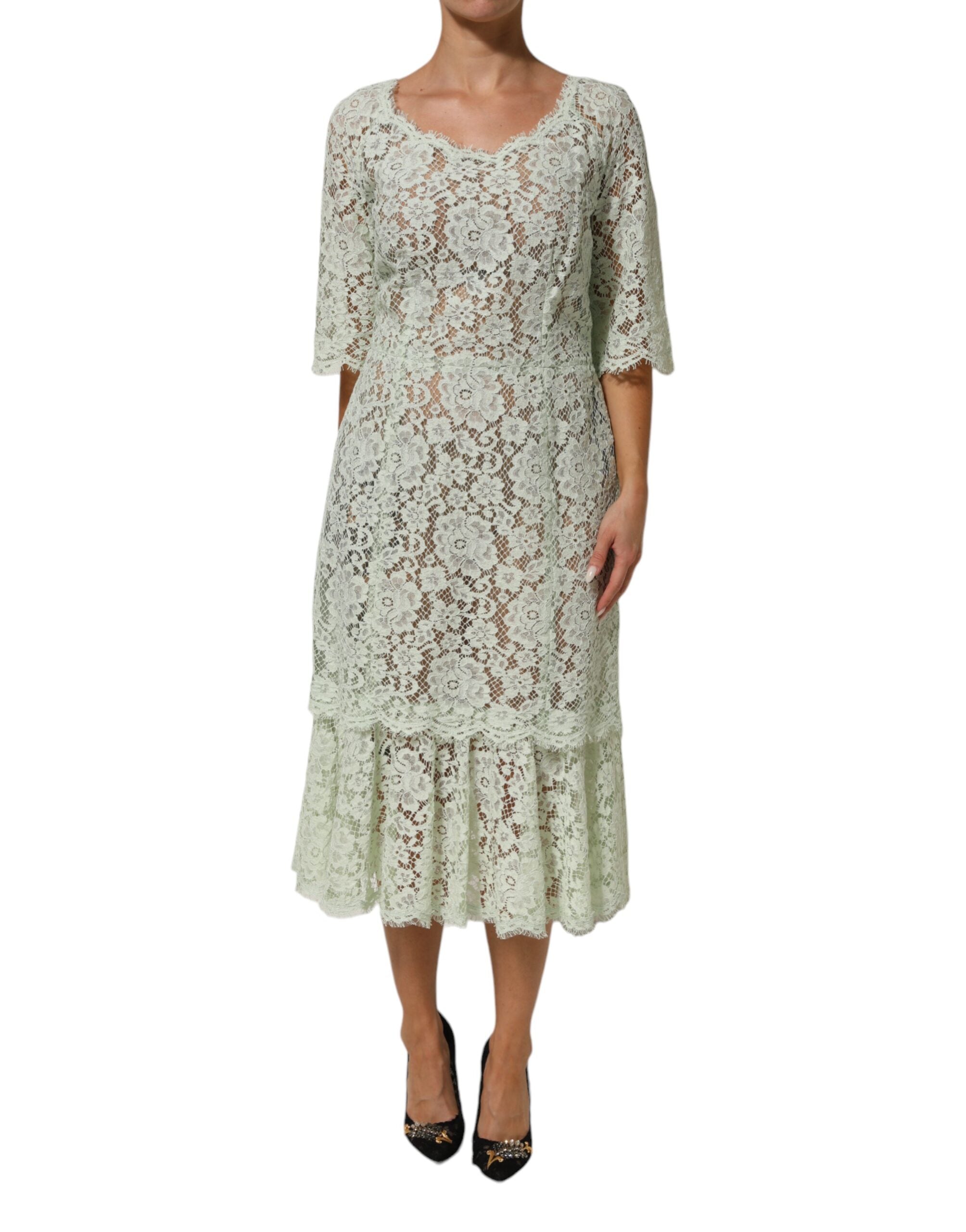 Indulge in the exquisite allure of the Dolce & Gabbana Mint Green Floral Lace Trim Midi Dress, crafted in Italy with luxurious materials for unforgettable elegance at any event.