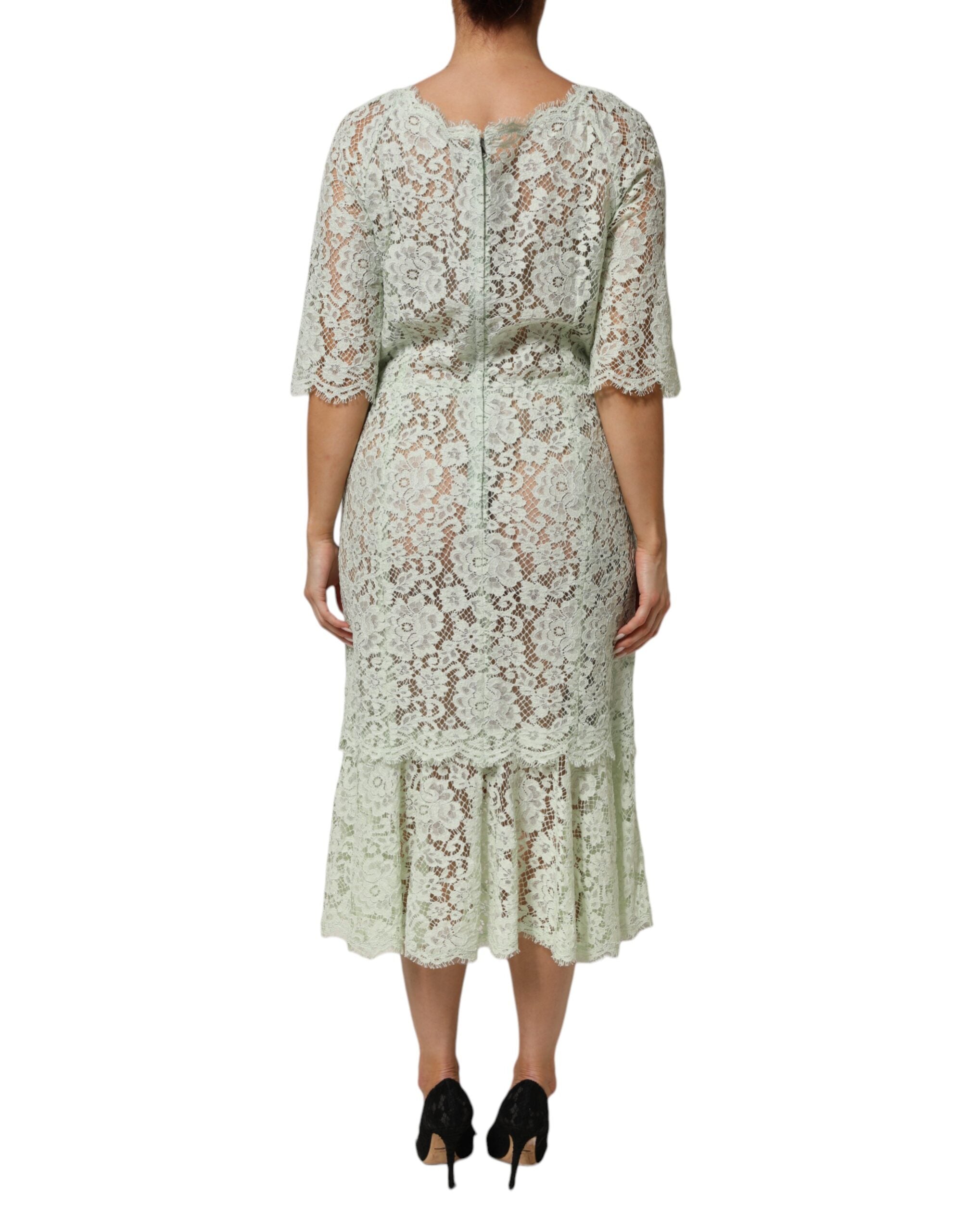 Indulge in the exquisite allure of the Dolce & Gabbana Mint Green Floral Lace Trim Midi Dress, crafted in Italy for those who embody elegance and sophistication.