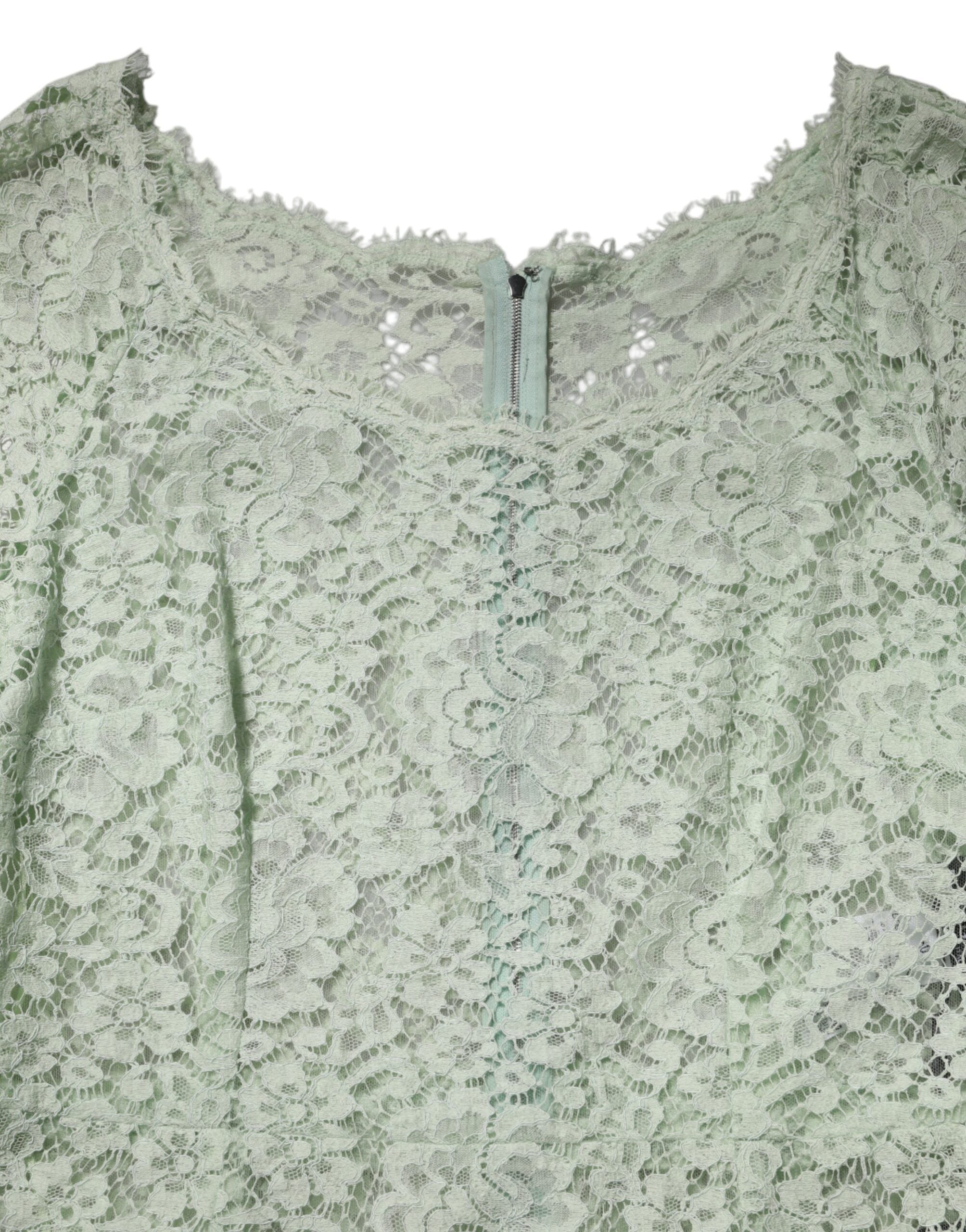Experience the allure of the Dolce & Gabbana Mint Green Floral Lace Trim Midi Dress, crafted in Italy with luxurious materials, perfect for unforgettable elegance at any event.