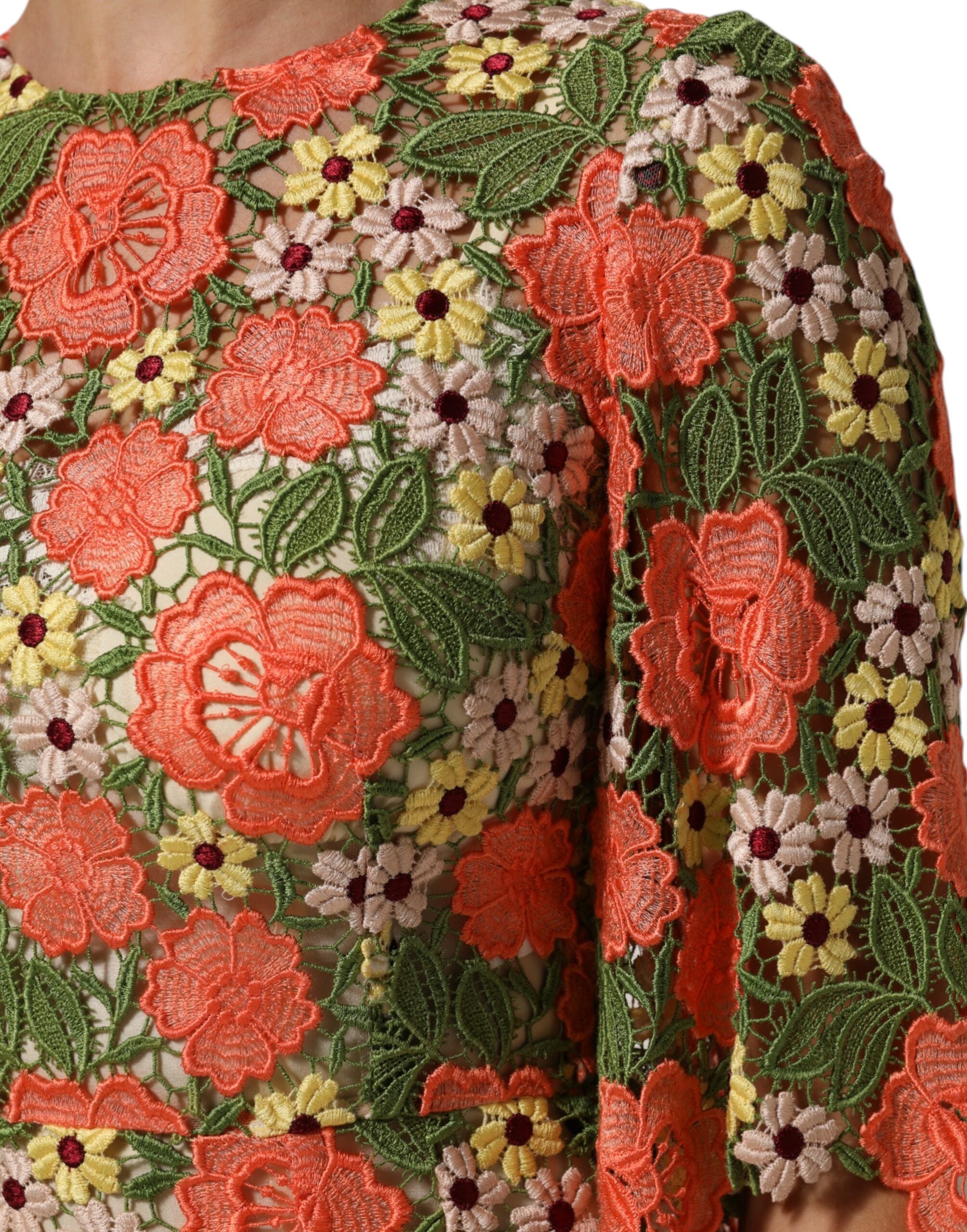 Indulge in the exquisite Dolce & Gabbana Multicolor Floral Embroidery Aline Mini Dress, a luxurious blend of elegance and artistry, perfect for unforgettable moments.