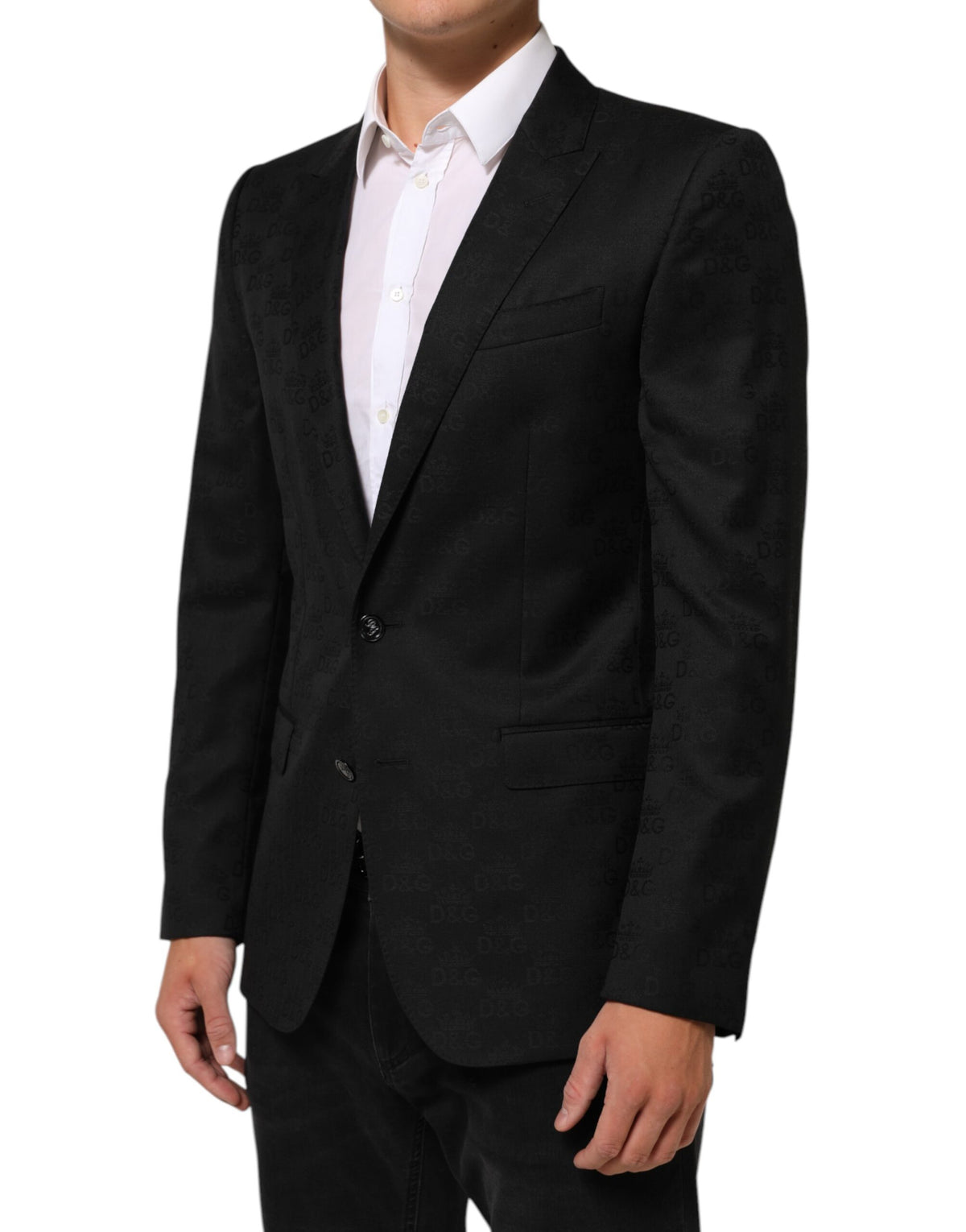 Elevate your wardrobe with the Dolce & Gabbana Black MARTINI Suit Jacket Blazer, crafted from luxurious virgin wool and silk, embodying timeless elegance and exquisite Italian craftsmanship.