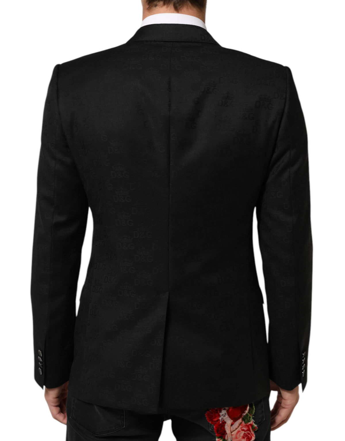 Elevate your wardrobe with the Dolce & Gabbana Black MARTINI Suit Jacket Blazer, a masterpiece of virgin wool and silk that embodies timeless elegance and exquisite Italian craftsmanship.