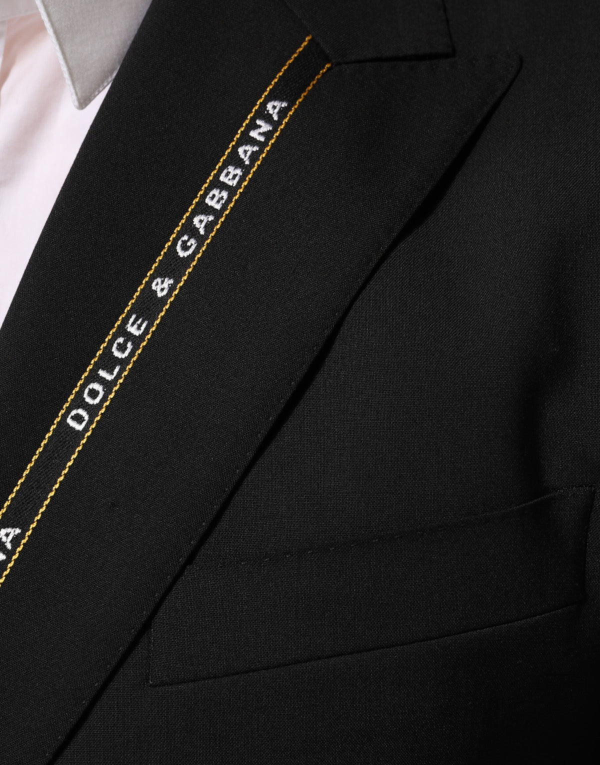 Experience the allure of the Dolce & Gabbana Black SICILIA Double Breasted Jacket Blazer, crafted from luxurious wool for timeless elegance and sophistication.