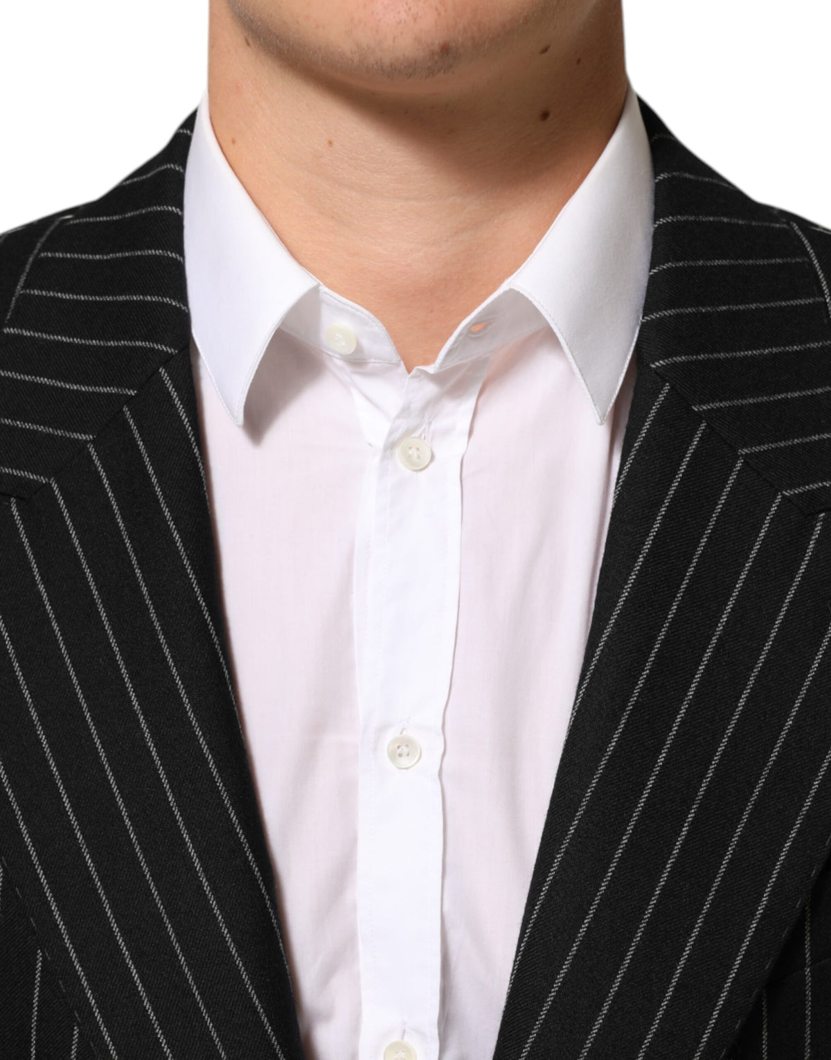 Discover the Dolce & Gabbana Black Stripes 2 Buttons Suit Jacket Blazer, an exquisite blend of Italian craftsmanship and timeless elegance, perfect for commanding presence.