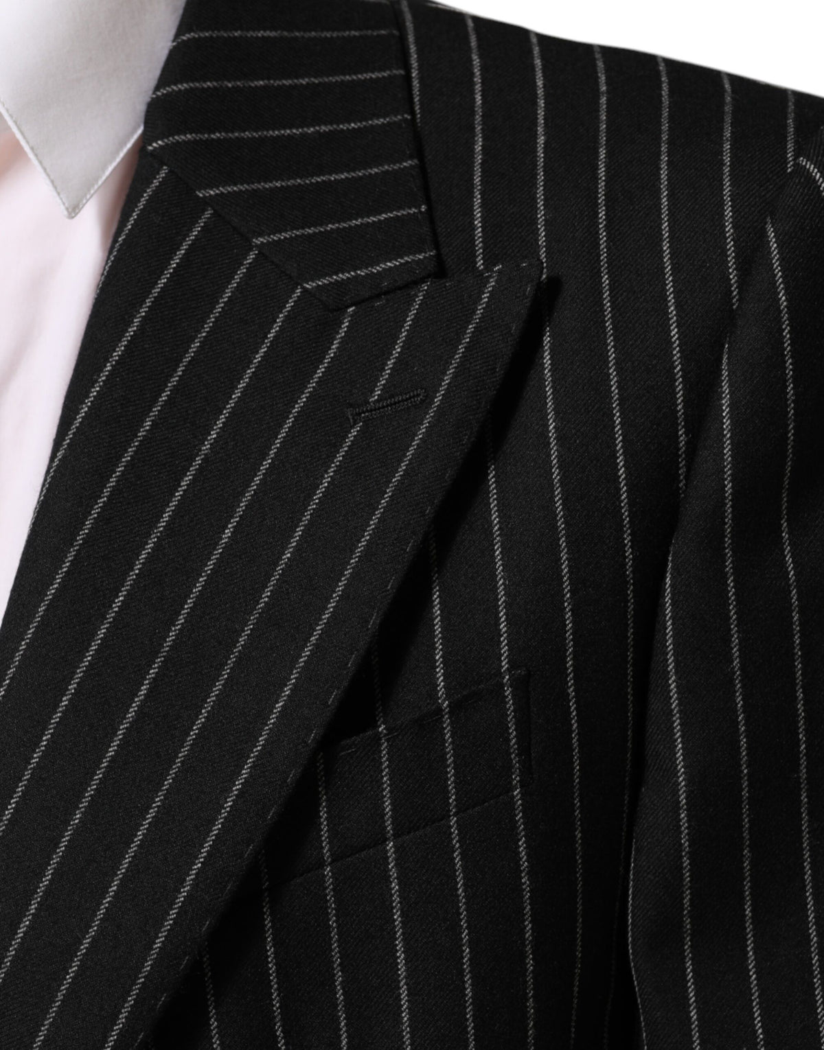 Experience the allure of Dolce & Gabbana's Black Stripes Suit Jacket Blazer, a masterpiece of Italian craftsmanship that embodies elegance and sophistication for the discerning individual.