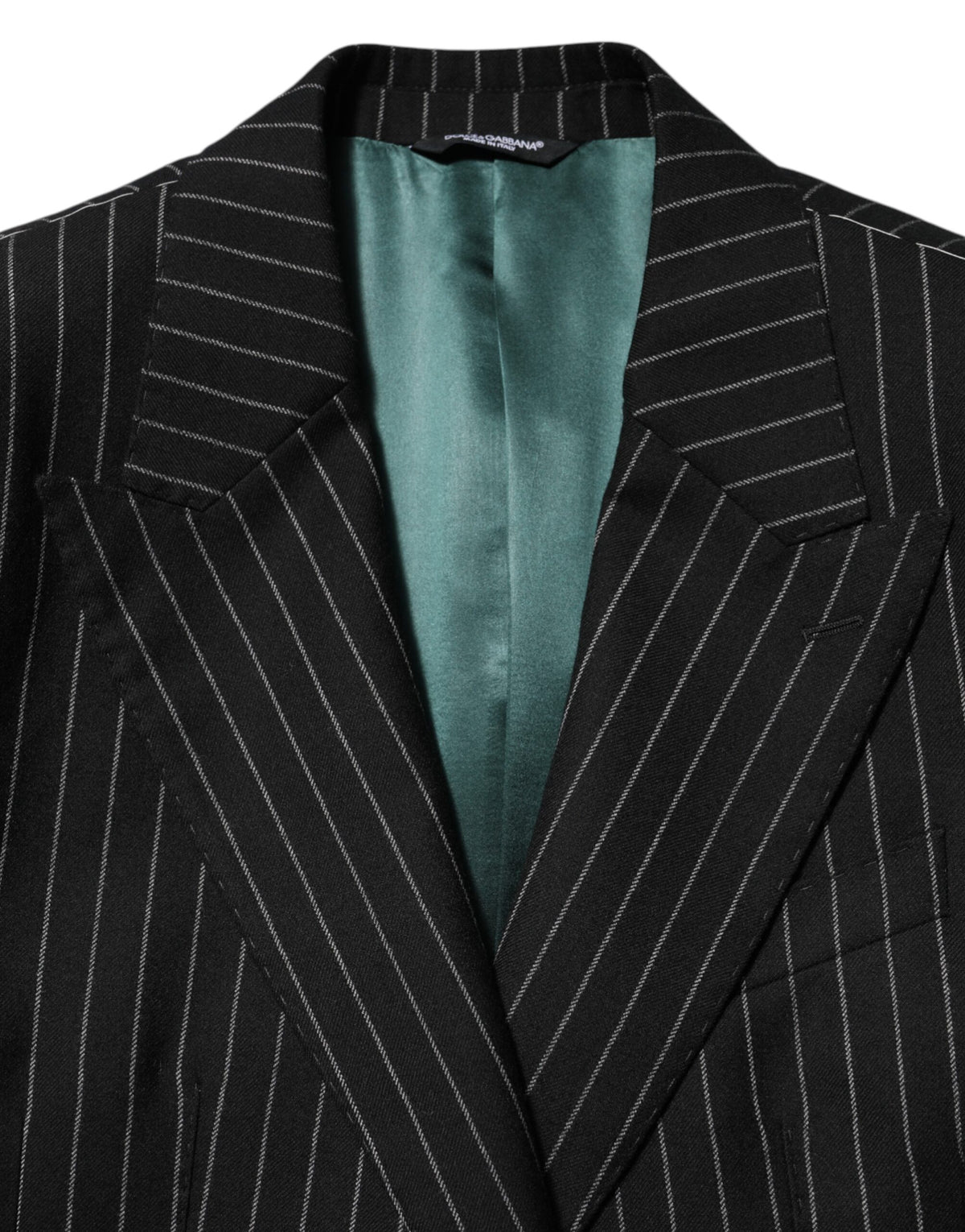 Experience the allure of Dolce & Gabbana's Black Stripes 2 Buttons Suit Jacket, where exquisite Italian craftsmanship meets timeless elegance, perfect for the discerning individual.