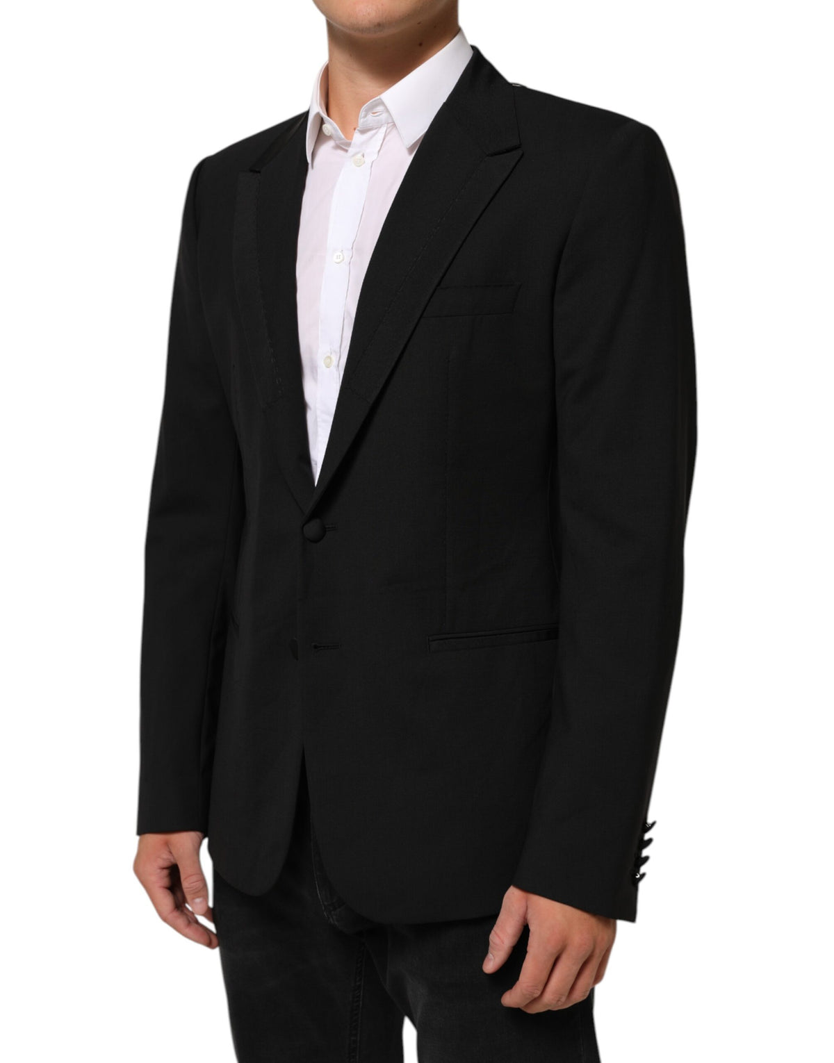 Indulge in the exquisite Dolce & Gabbana Black Wool Blazer, a masterful blend of luxury and sophistication, crafted from premium materials for the discerning individual.