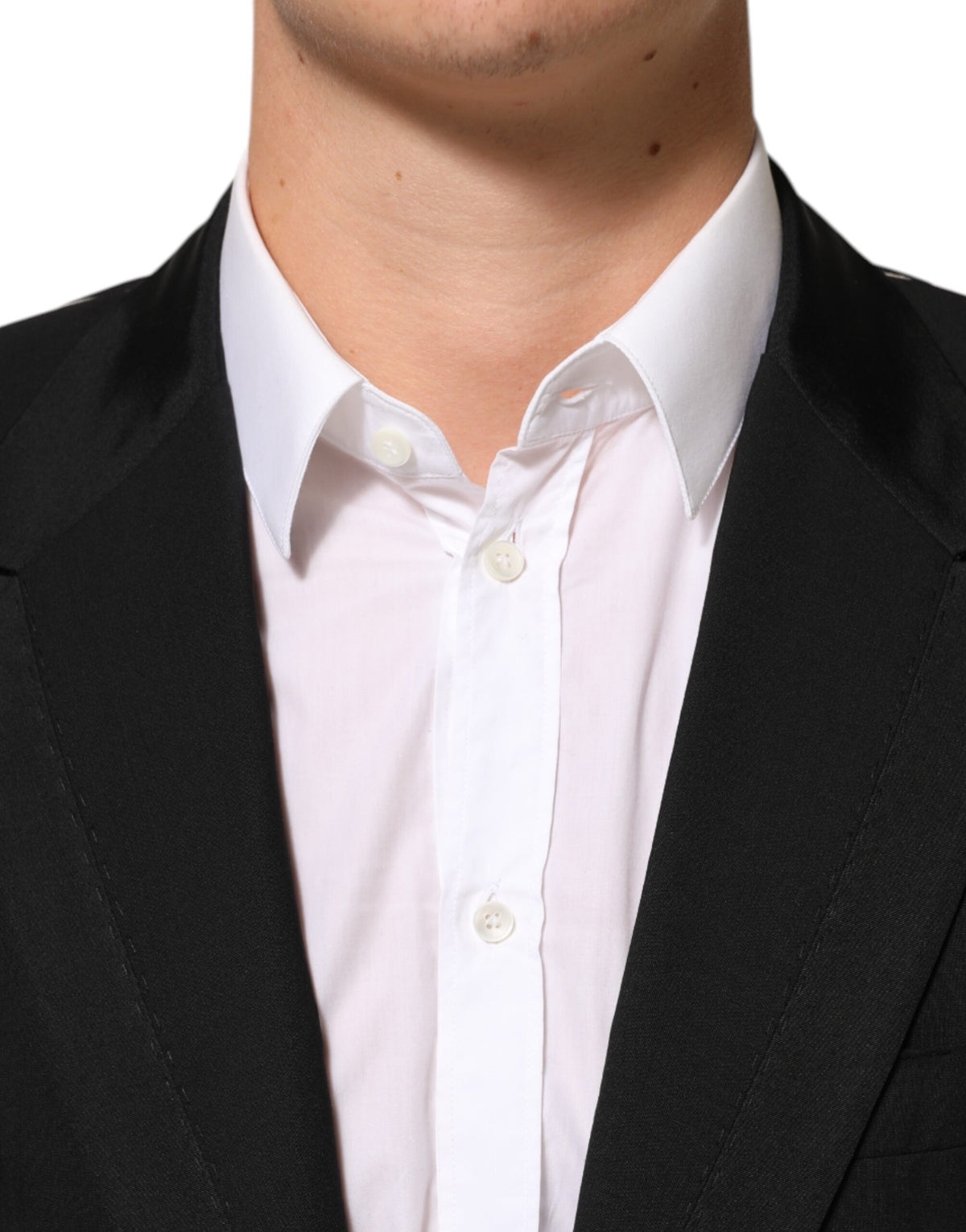 Experience the allure of Dolce & Gabbana's Black Wool Blazer, a masterclass in Italian craftsmanship, blending luxurious materials with timeless elegance for the discerning individual.