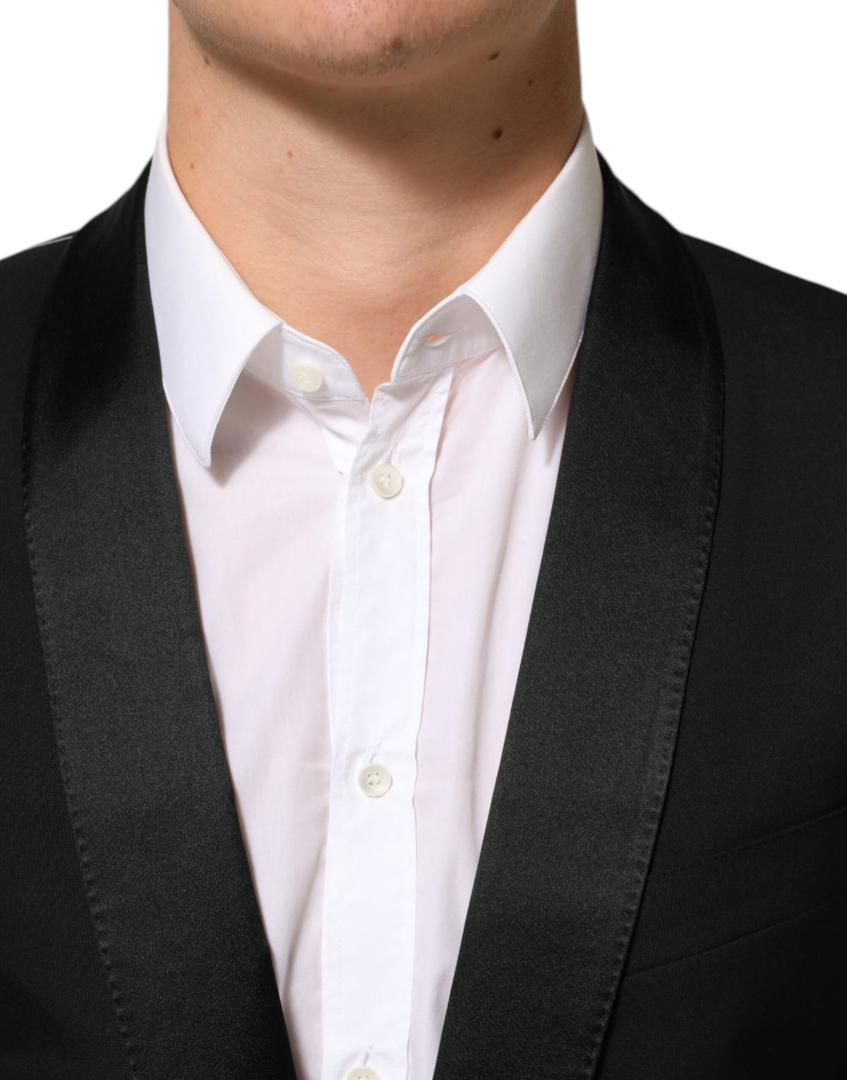 Indulge in the exquisite Dolce & Gabbana Black MARTINI Blazer, a masterpiece of Italian craftsmanship that elevates your style with timeless elegance and sophistication.