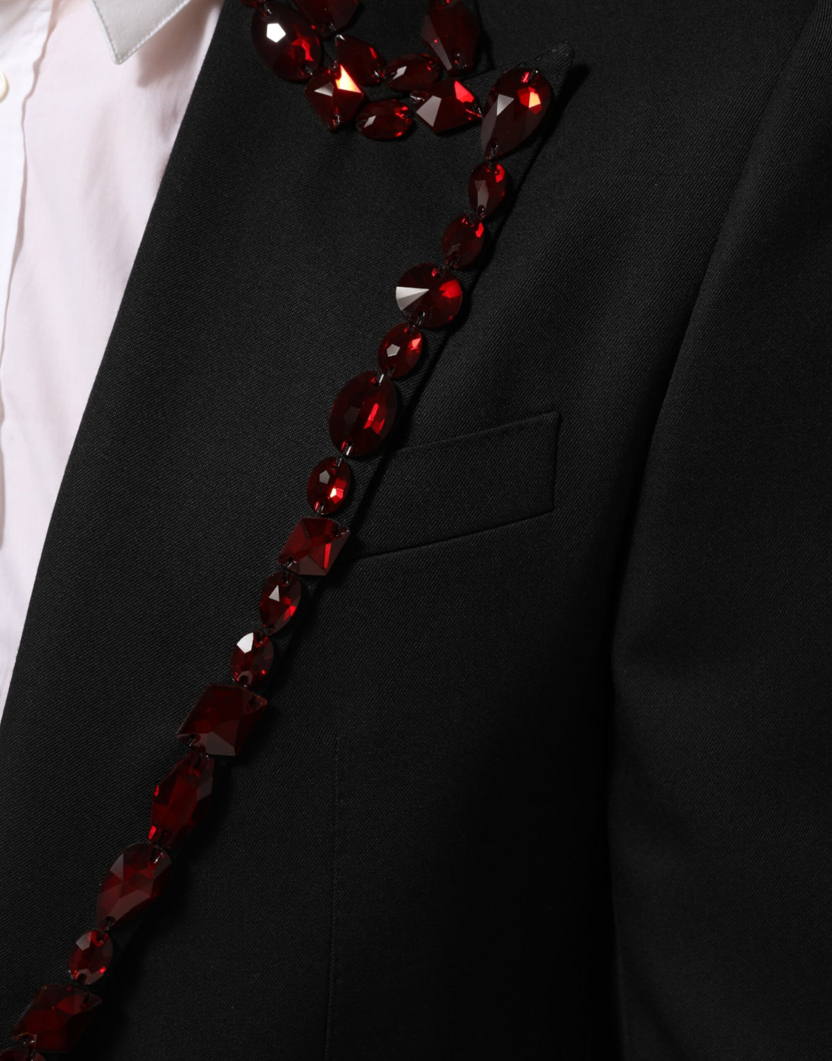 Elevate your wardrobe with the Dolce & Gabbana Black SICILIA Crystal Embellished Blazer, a masterpiece of Italian craftsmanship that embodies luxury and sophistication.