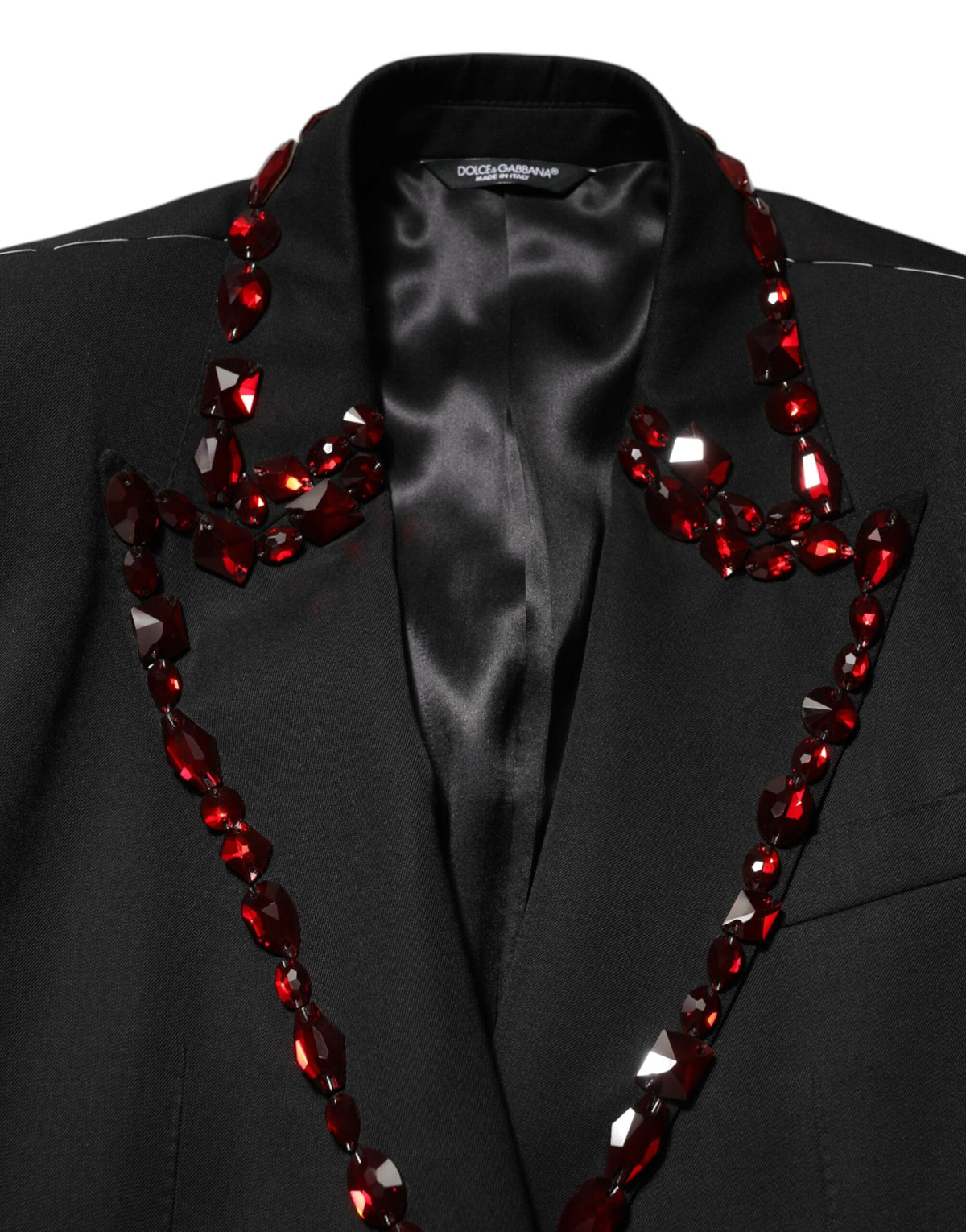 Elevate your wardrobe with the Dolce & Gabbana Black SICILIA Crystal Embellished Blazer, a masterpiece of Italian craftsmanship that exudes luxury and sophistication.
