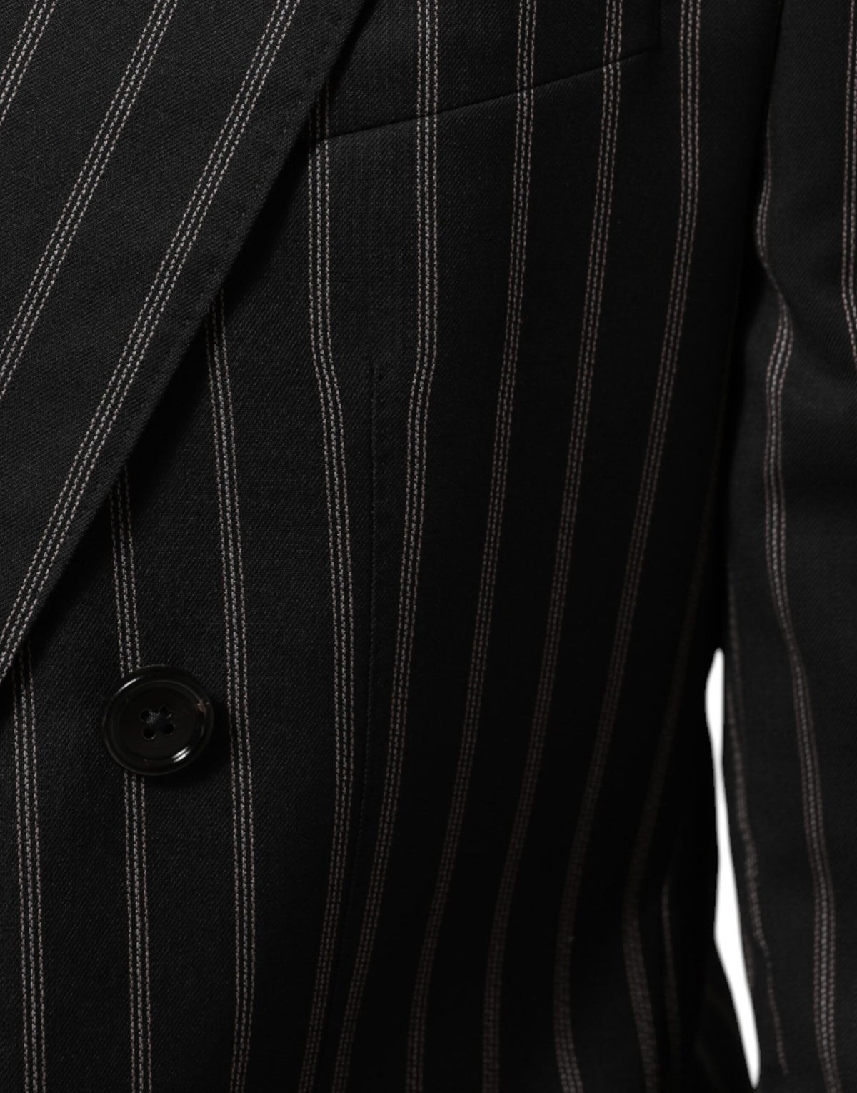 Indulge in the exquisite Dolce & Gabbana Black Stripes SICILIA Blazer, a masterpiece of Italian craftsmanship that embodies elegance and sophistication for the discerning individual.