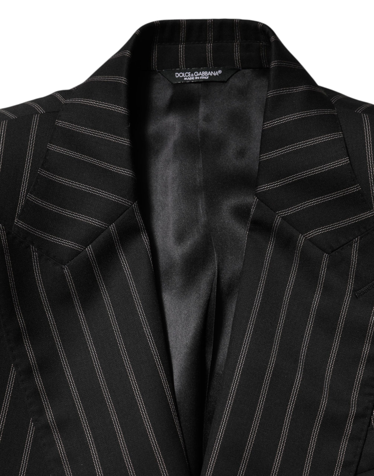 Elevate your elegance with the Dolce & Gabbana Black Stripes SICILIA Blazer, a masterpiece of Italian craftsmanship that embodies sophistication and allure for every occasion.