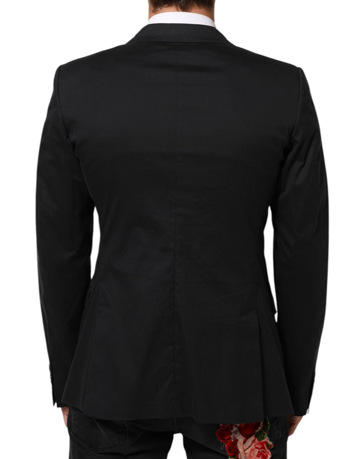Elevate your style with the Dolce & Gabbana Black Cotton 2 Buttons Suit Jacket Blazer, a masterpiece of Italian craftsmanship, blending luxurious materials for timeless elegance.