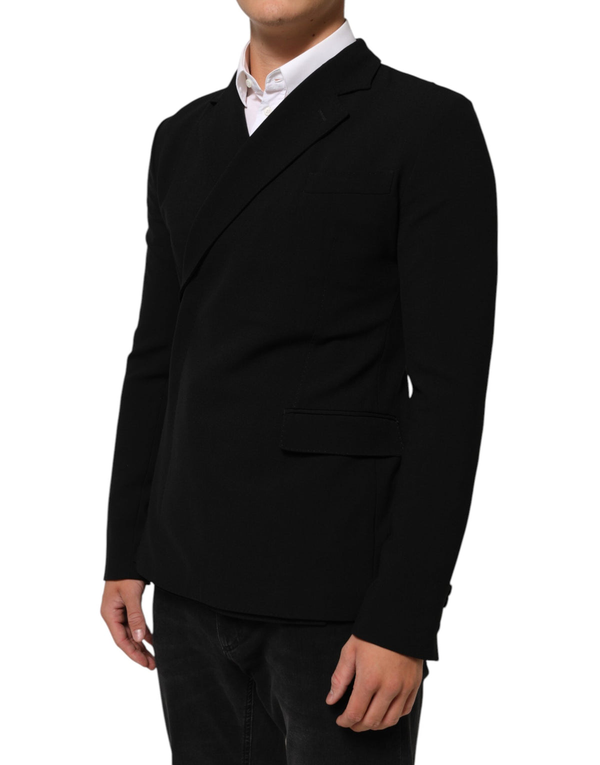 Elevate your wardrobe with the Dolce & Gabbana Black Wool Double Breasted Blazer, a masterpiece of Italian craftsmanship that embodies timeless sophistication and luxurious allure.