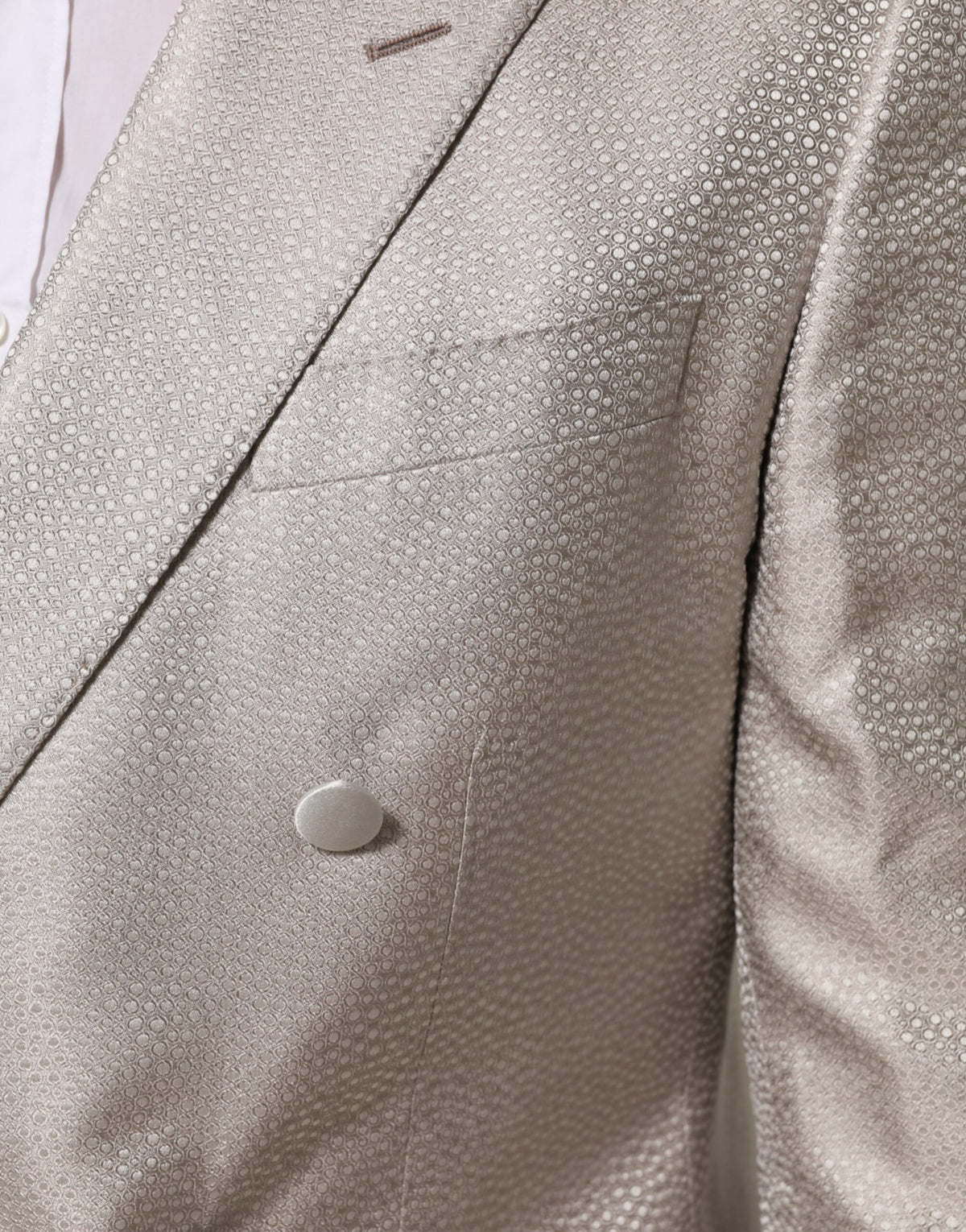 Elevate your elegance with the Dolce & Gabbana Beige MARTINI Double-Breasted Suit Blazer, a luxurious silk masterpiece that embodies timeless sophistication and refined versatility.