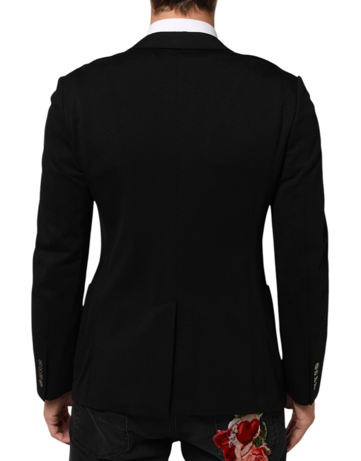 Elevate your wardrobe with the Dolce & Gabbana Black Viscose Blazer, a masterpiece of Italian craftsmanship that embodies timeless elegance and sophisticated allure.