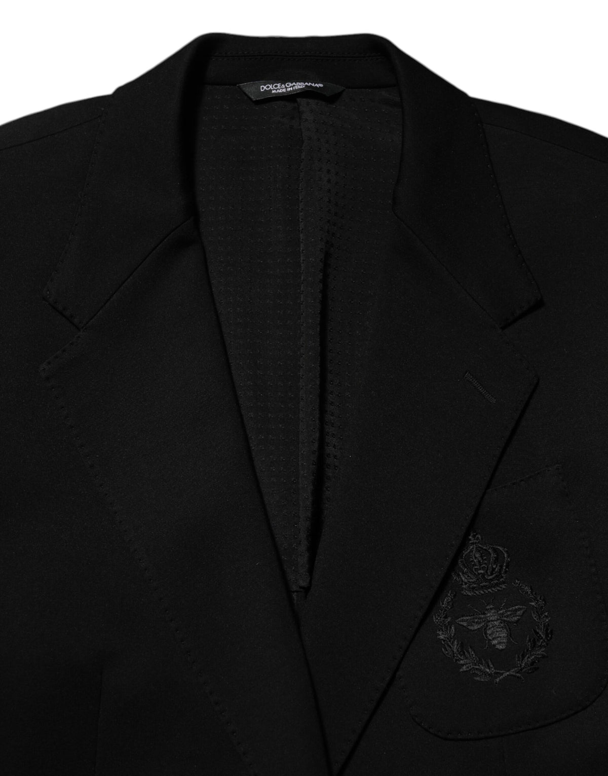Elevate your style with the Dolce & Gabbana Black Viscose 2 Buttons Suit Jacket Blazer, a masterpiece of Italian craftsmanship that embodies timeless elegance and sophistication.