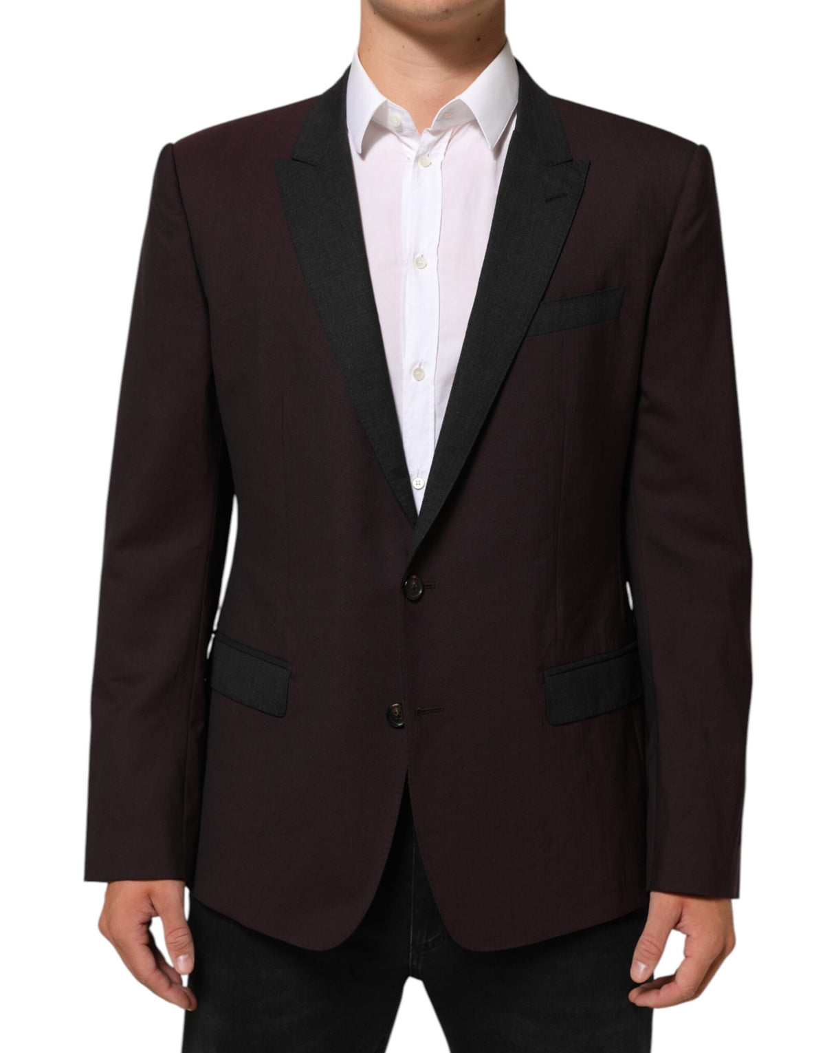 Indulge in the exquisite Dolce & Gabbana Maroon Wool 2 Buttons Suit Jacket Blazer, a masterpiece of Italian craftsmanship that embodies sophistication and elegance for the discerning individual.