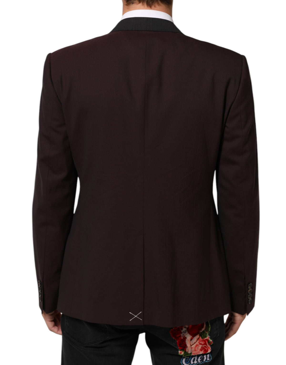 Indulge in the exquisite Dolce & Gabbana Maroon Wool Blazer, a masterpiece of Italian craftsmanship that elevates your elegance and confidence for any occasion.