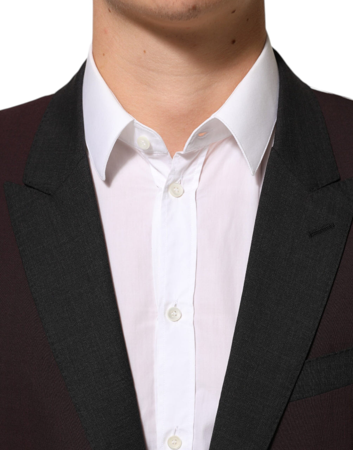Elevate your wardrobe with the Dolce & Gabbana Maroon Wool Blazer, a masterpiece of Italian craftsmanship that embodies sophistication and timeless elegance for the discerning individual.