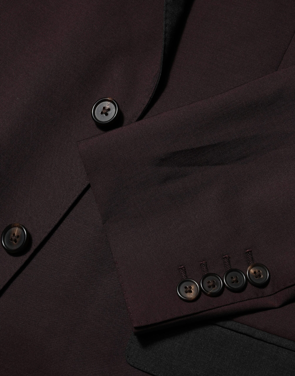Indulge in the exquisite Dolce & Gabbana Maroon Wool Blazer, a masterpiece of Italian craftsmanship that embodies elegance and sophistication for the discerning individual.