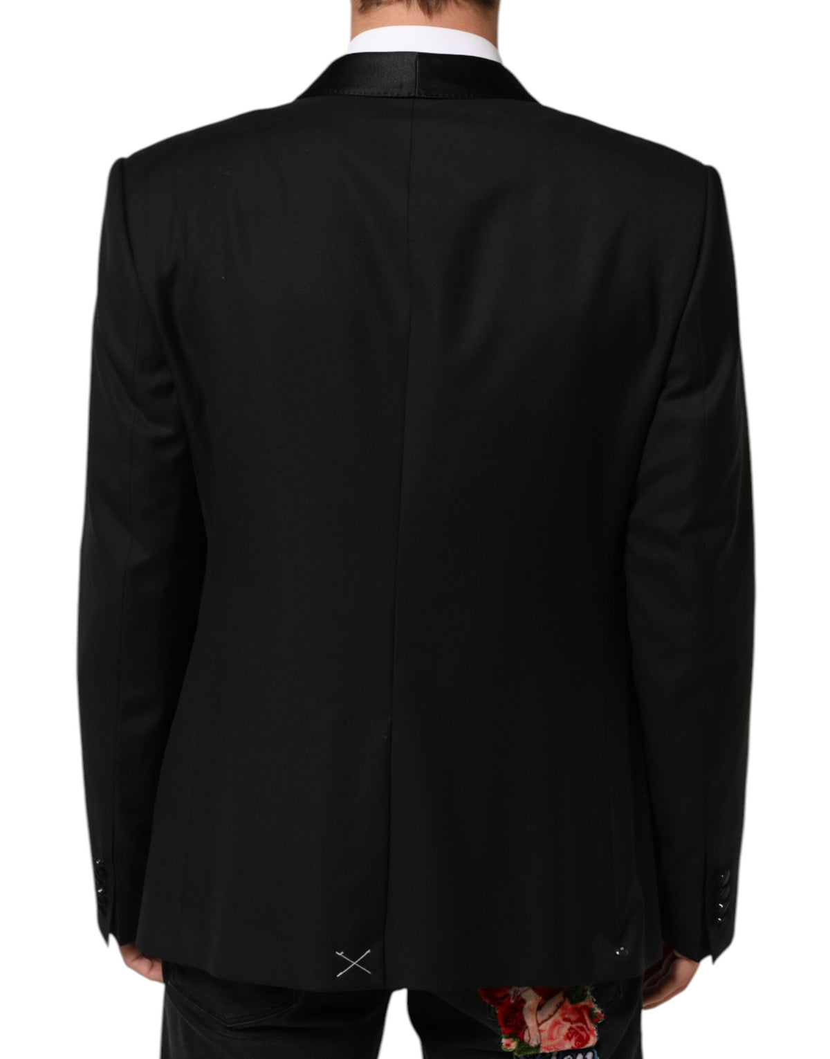 Indulge in the timeless elegance of the Dolce & Gabbana Black Wool GOLD 1 Button Suit Blazer, a masterpiece of Italian craftsmanship that exudes sophistication and allure.