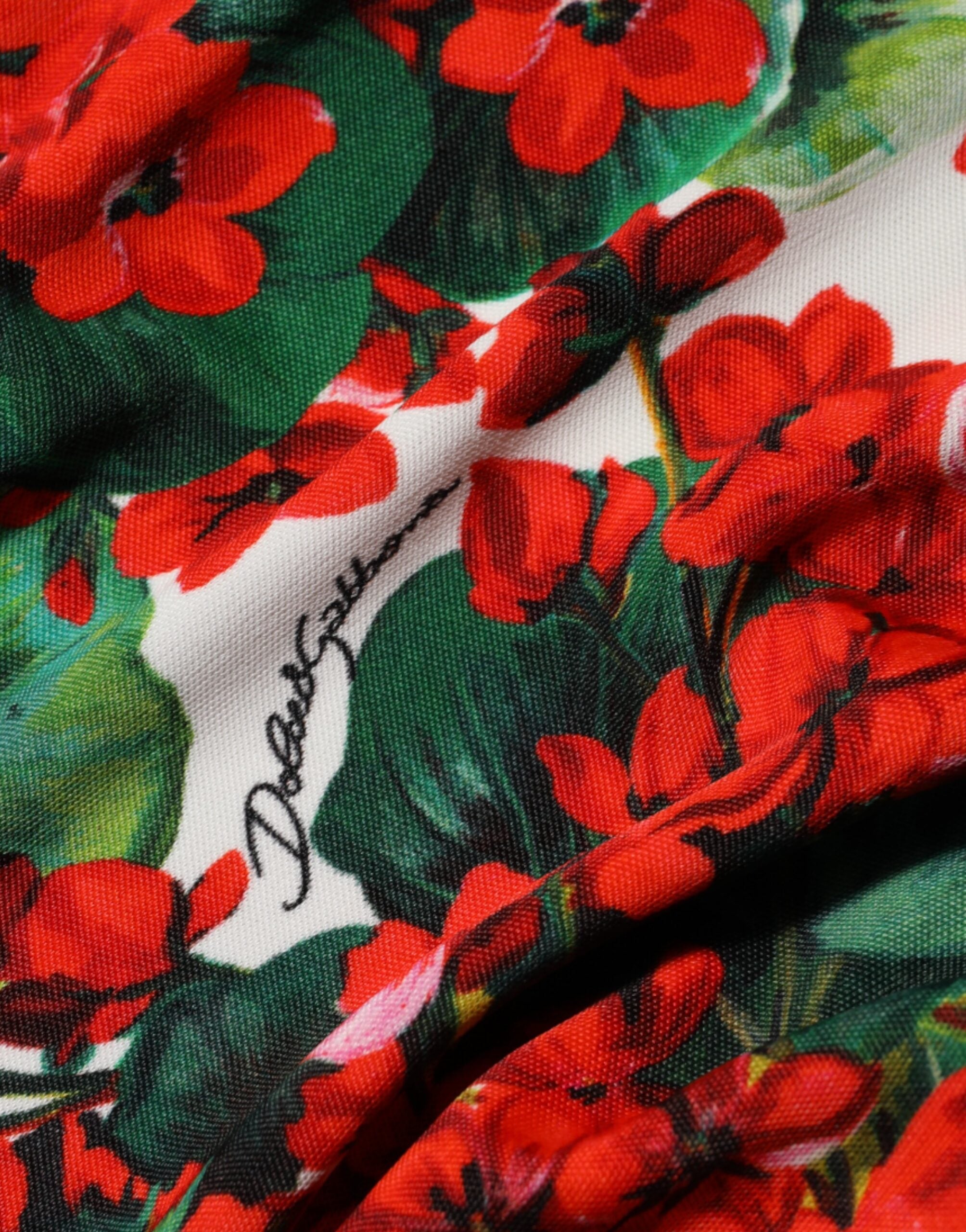 Indulge in the exquisite Dolce & Gabbana Multicolor Floral Short Portofino Dress, crafted from luxurious Vi, embodying elegance and Mediterranean charm for unforgettable moments.