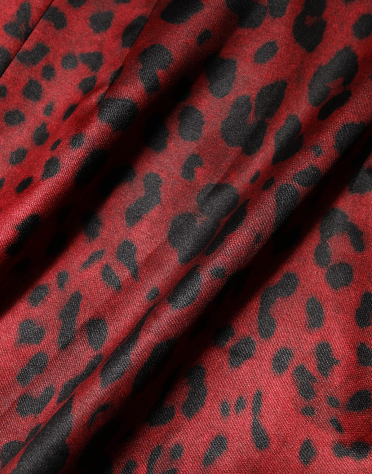 Indulge in the exquisite allure of the Dolce & Gabbana Red Leopard Sheath Long Sleeves Dress, a masterpiece of Italian craftsmanship that elevates your elegance for any occasion.