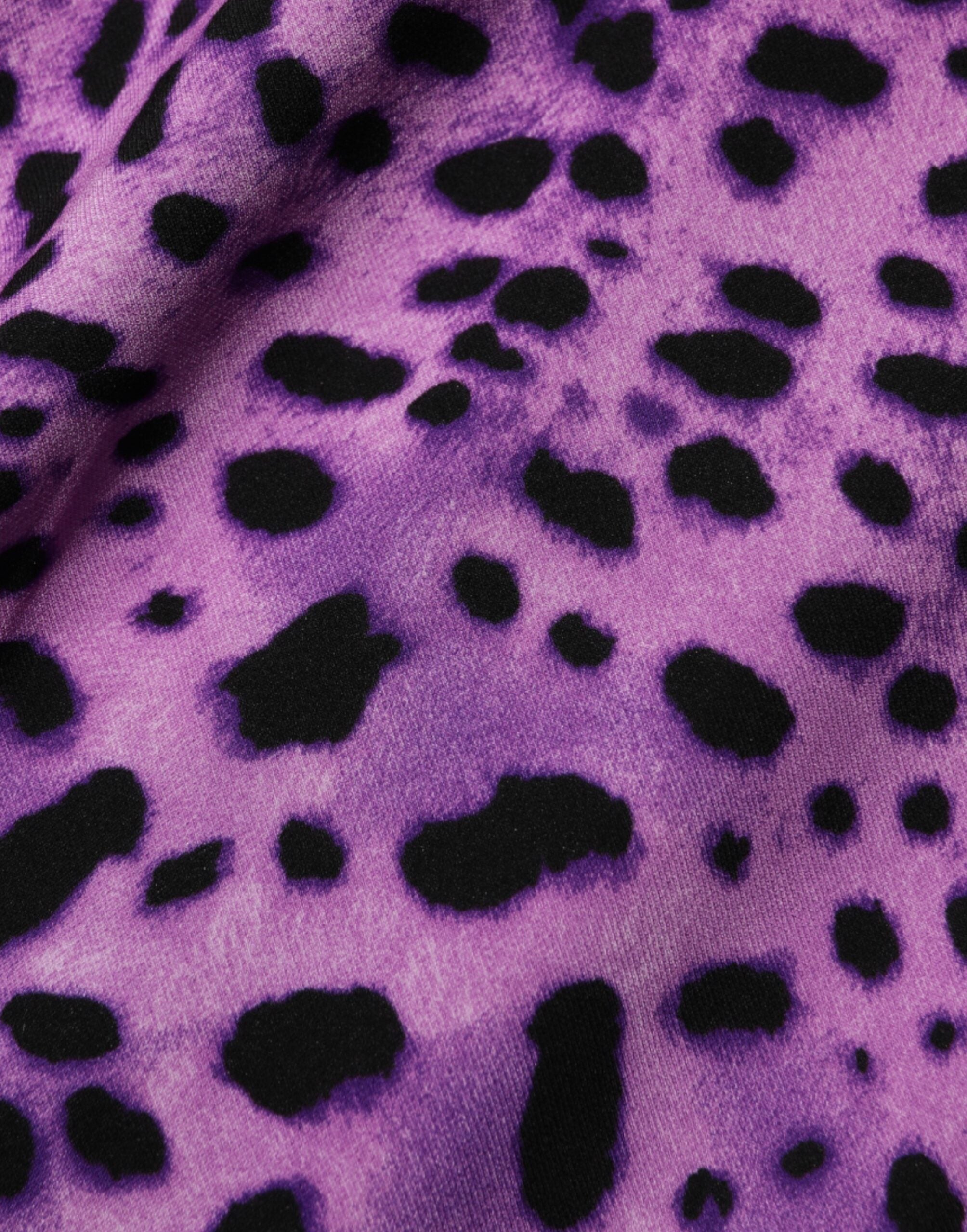 Indulge in the exquisite Dolce & Gabbana Violet Leopard Sheath Bodycon Mini Dress, crafted from luxurious silk and elastane, embodying Italian glamour and timeless elegance.