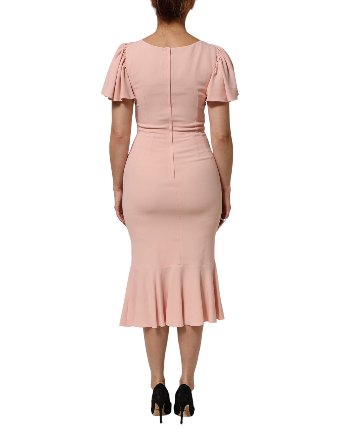 Indulge in the exquisite Dolce & Gabbana Pink Viscose Sheath Midi Dress, a luxurious blend of elegance and sophistication, perfect for the discerning individual.