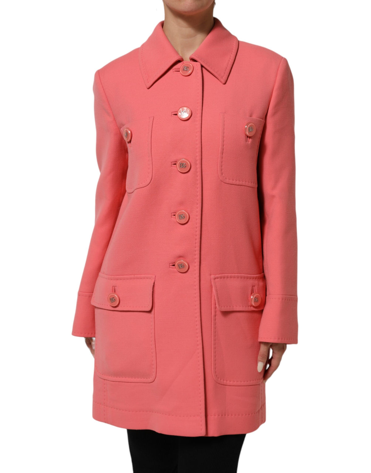 Elevate your wardrobe with the Dolce & Gabbana Pink Buttoned Down Trench Coat, a timeless masterpiece crafted from a sumptuous wool blend, embodying luxurious elegance and Italian artistry.