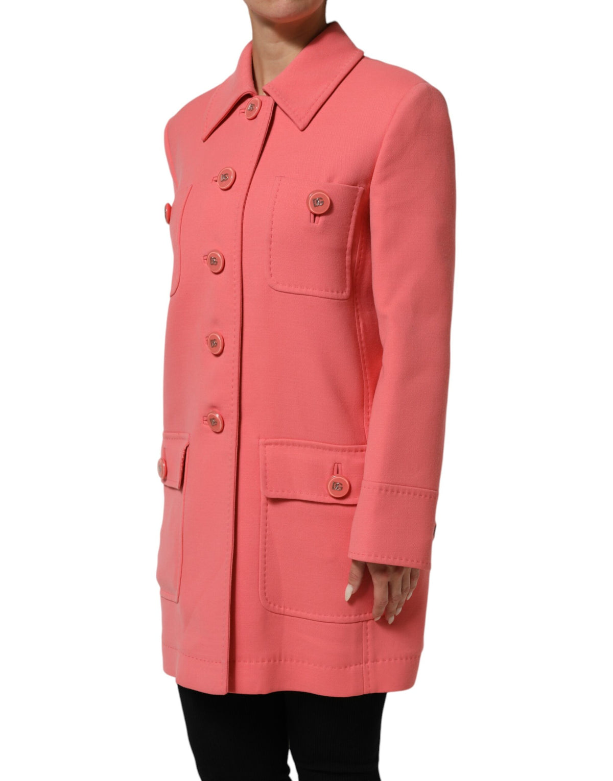 Experience the essence of luxury with the Dolce & Gabbana Pink Buttoned Down Trench Coat, a timeless masterpiece crafted from a sumptuous wool blend, epitomizing refined elegance.