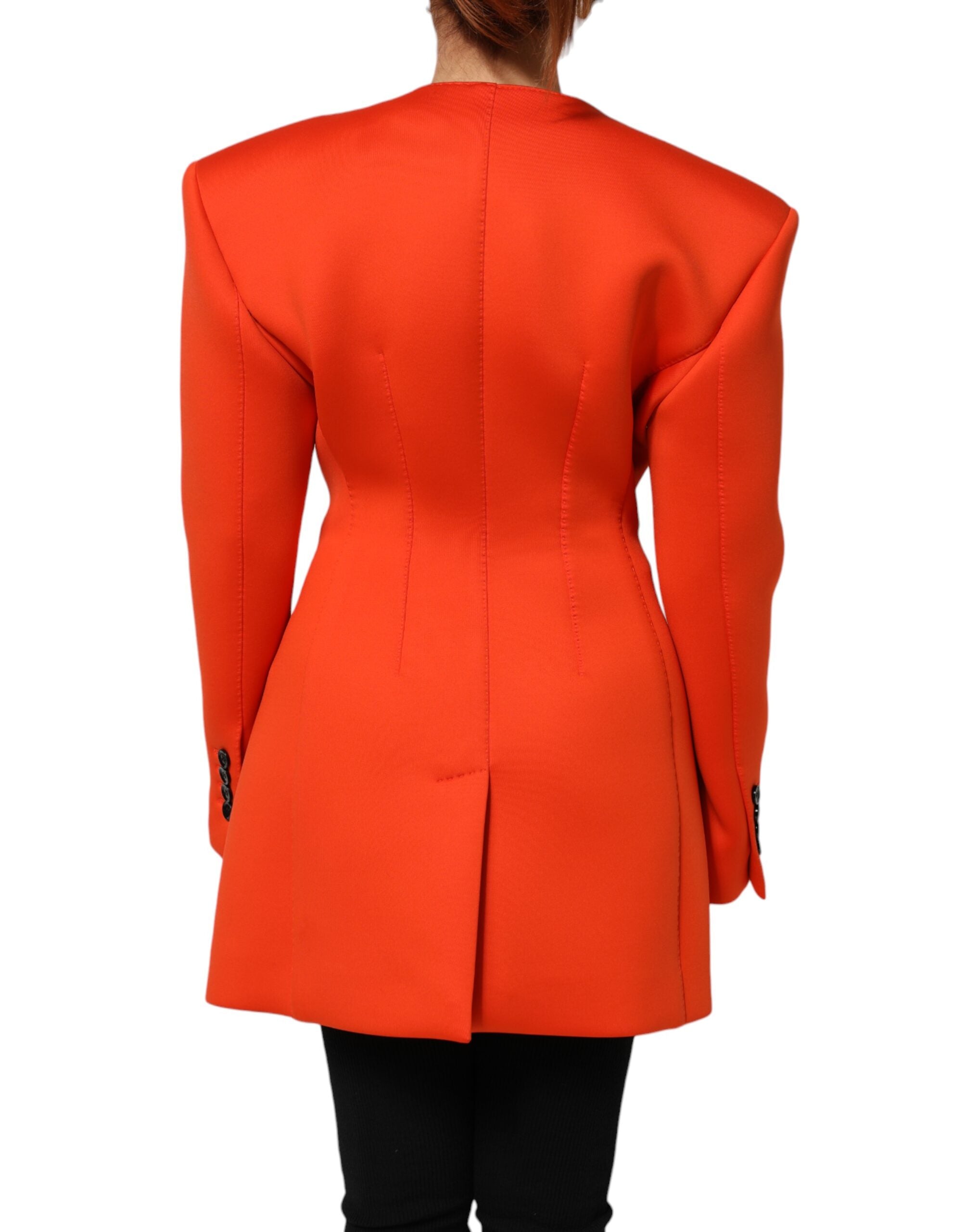 Indulge in the exquisite Dolce & Gabbana Red Buttoned Down Trench Coat, a masterpiece of Italian craftsmanship that redefines luxury and elevates your style.