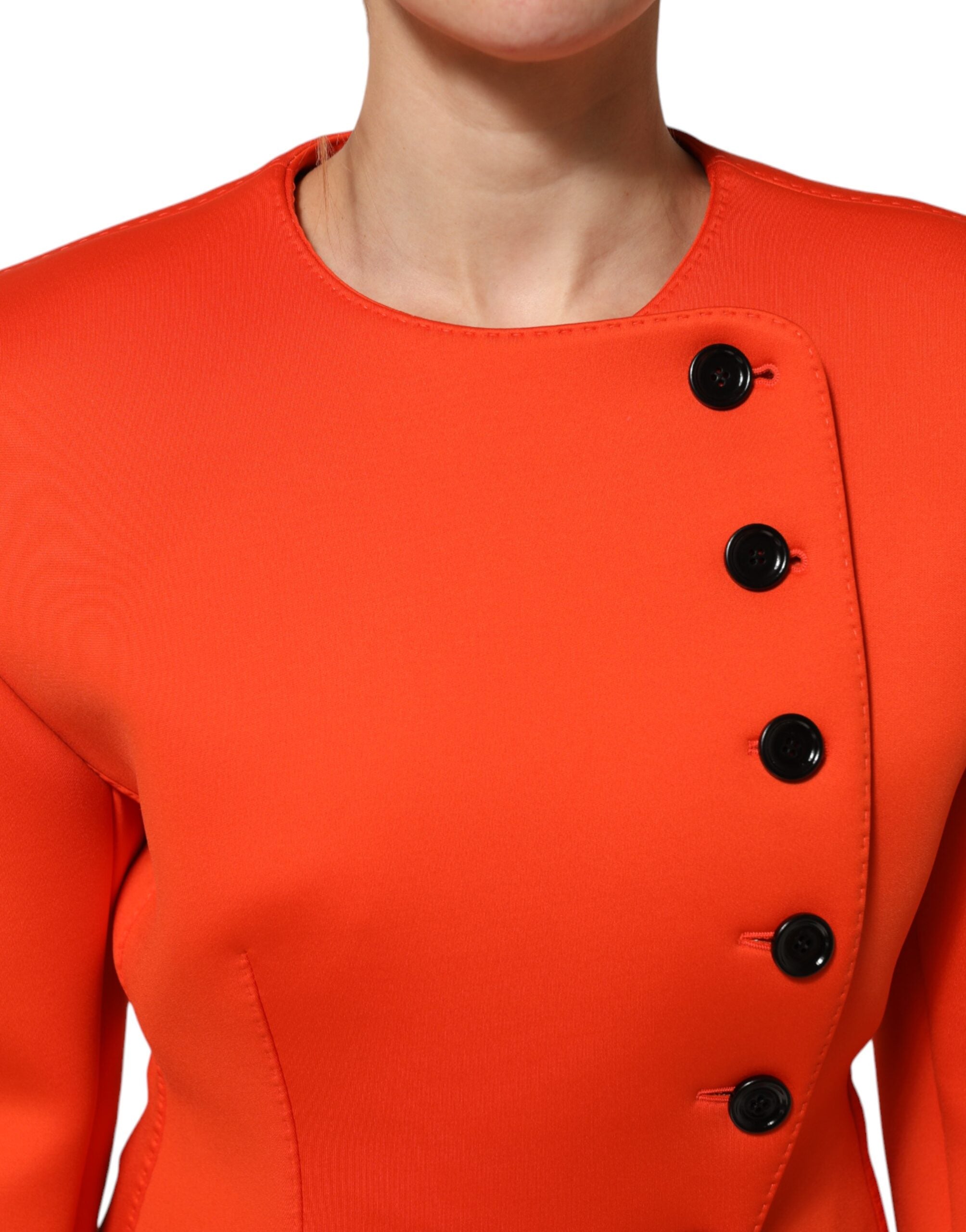 Elevate your style with the Dolce & Gabbana Red Buttoned Down Trench Coat, a masterpiece of Italian craftsmanship that embodies timeless elegance and luxurious allure.