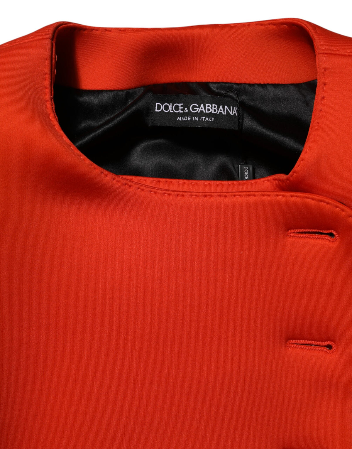 Elevate your wardrobe with the Dolce & Gabbana Red Buttoned Down Women Trench Coat, a masterpiece of Italian craftsmanship that embodies timeless elegance and luxurious allure.